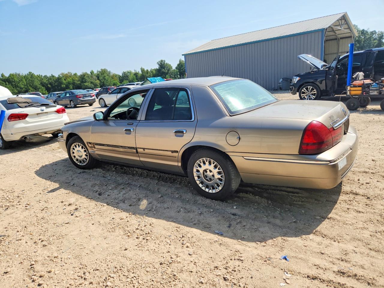2004 Mercury Grand Marquis Gs Tan vin: 2MEFM74W14X635272