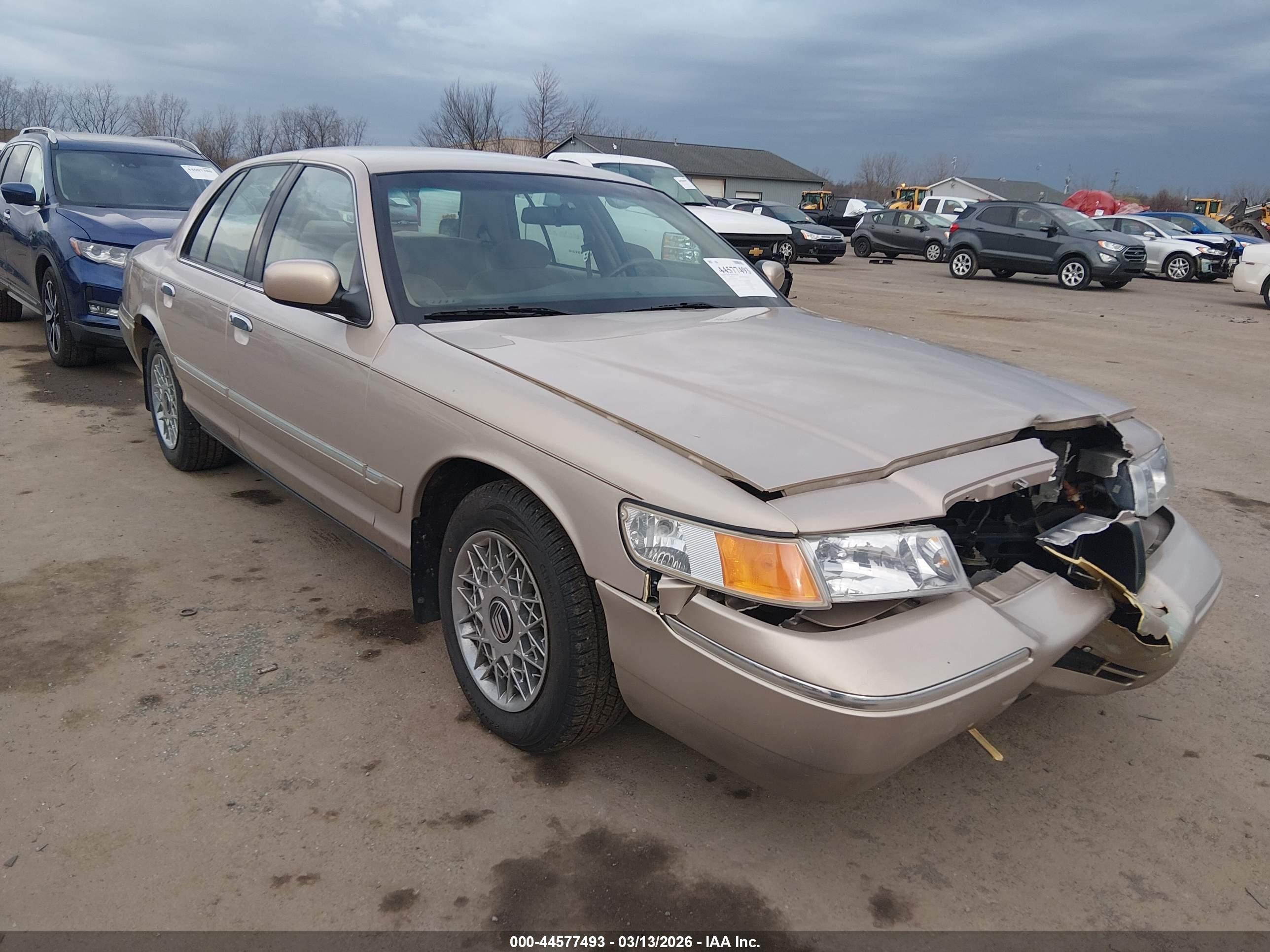 1998 Mercury Grand Marquis   Tan vin: 2MEFM74W1WX618765