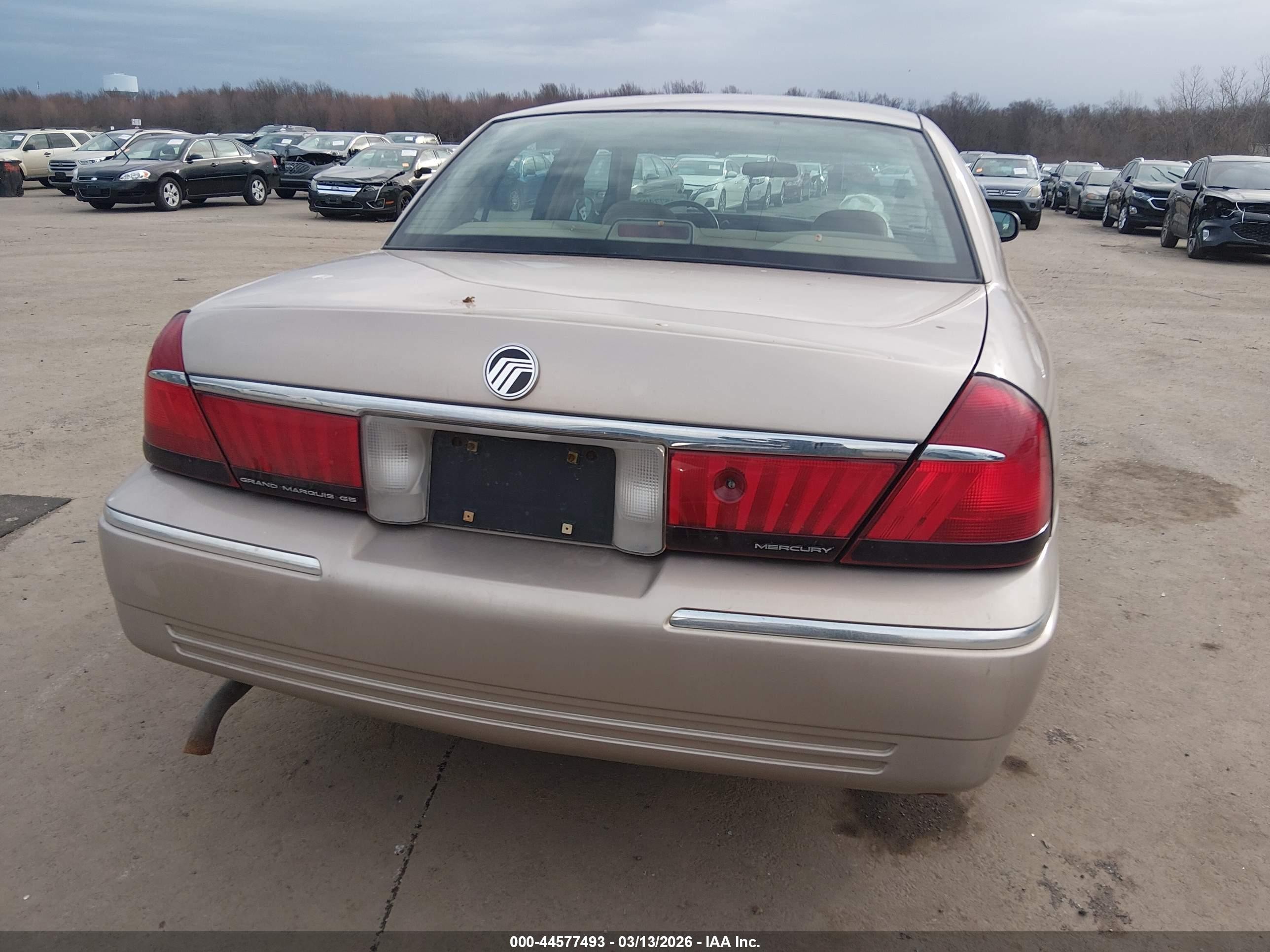 1998 Mercury Grand Marquis   Tan vin: 2MEFM74W1WX618765