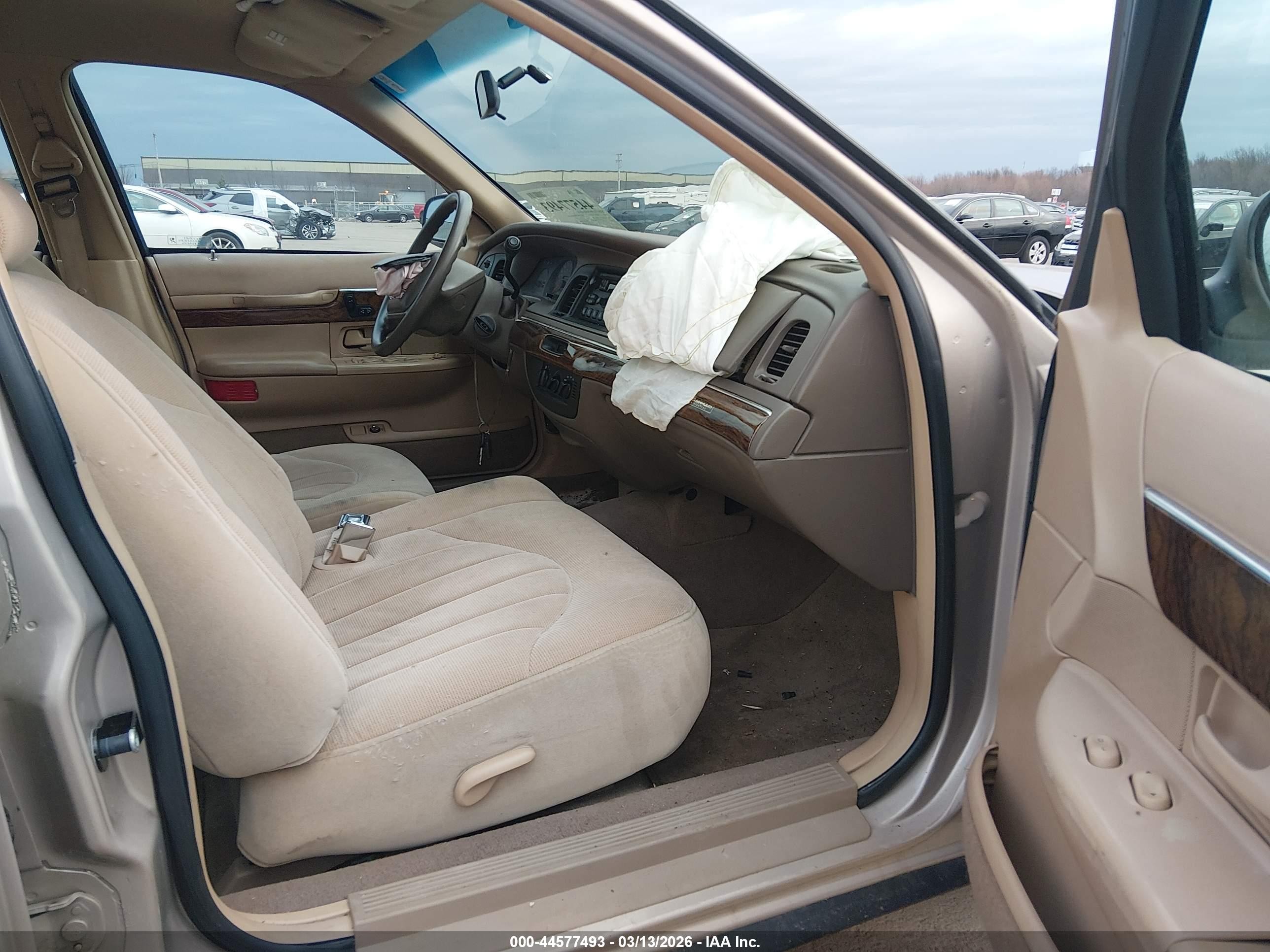1998 Mercury Grand Marquis   Tan vin: 2MEFM74W1WX618765