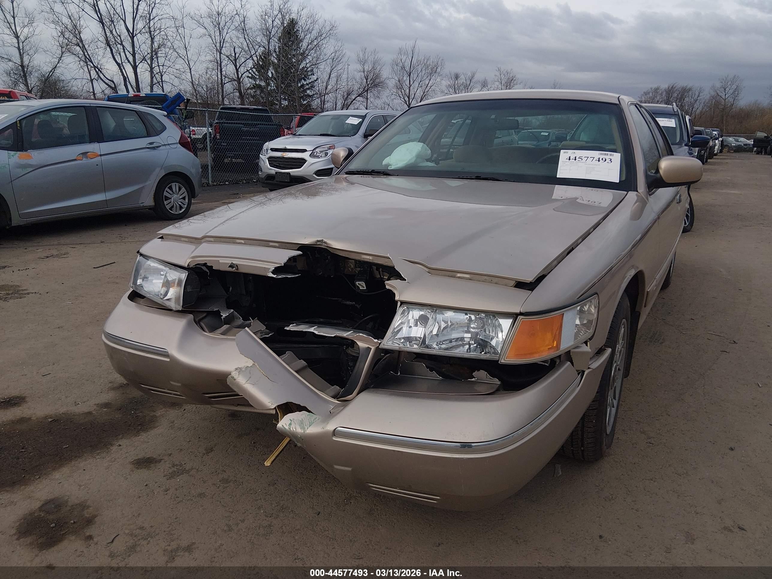 1998 Mercury Grand Marquis   Tan vin: 2MEFM74W1WX618765