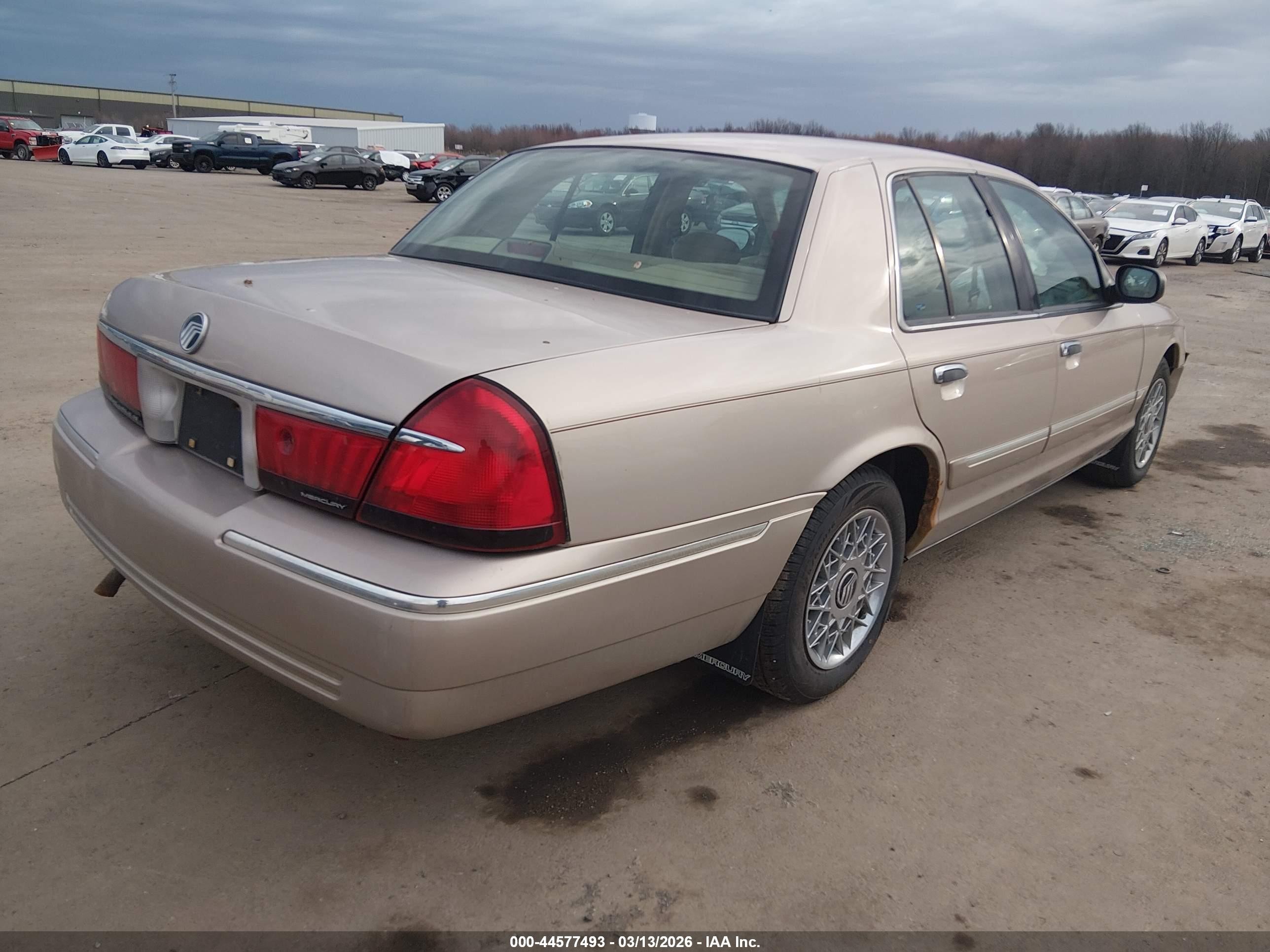 1998 Mercury Grand Marquis   Tan vin: 2MEFM74W1WX618765