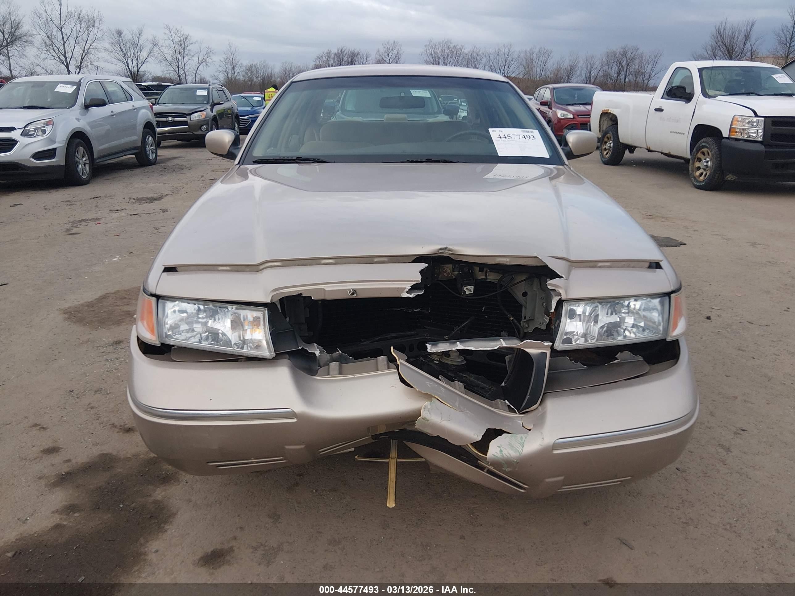 1998 Mercury Grand Marquis   Tan vin: 2MEFM74W1WX618765