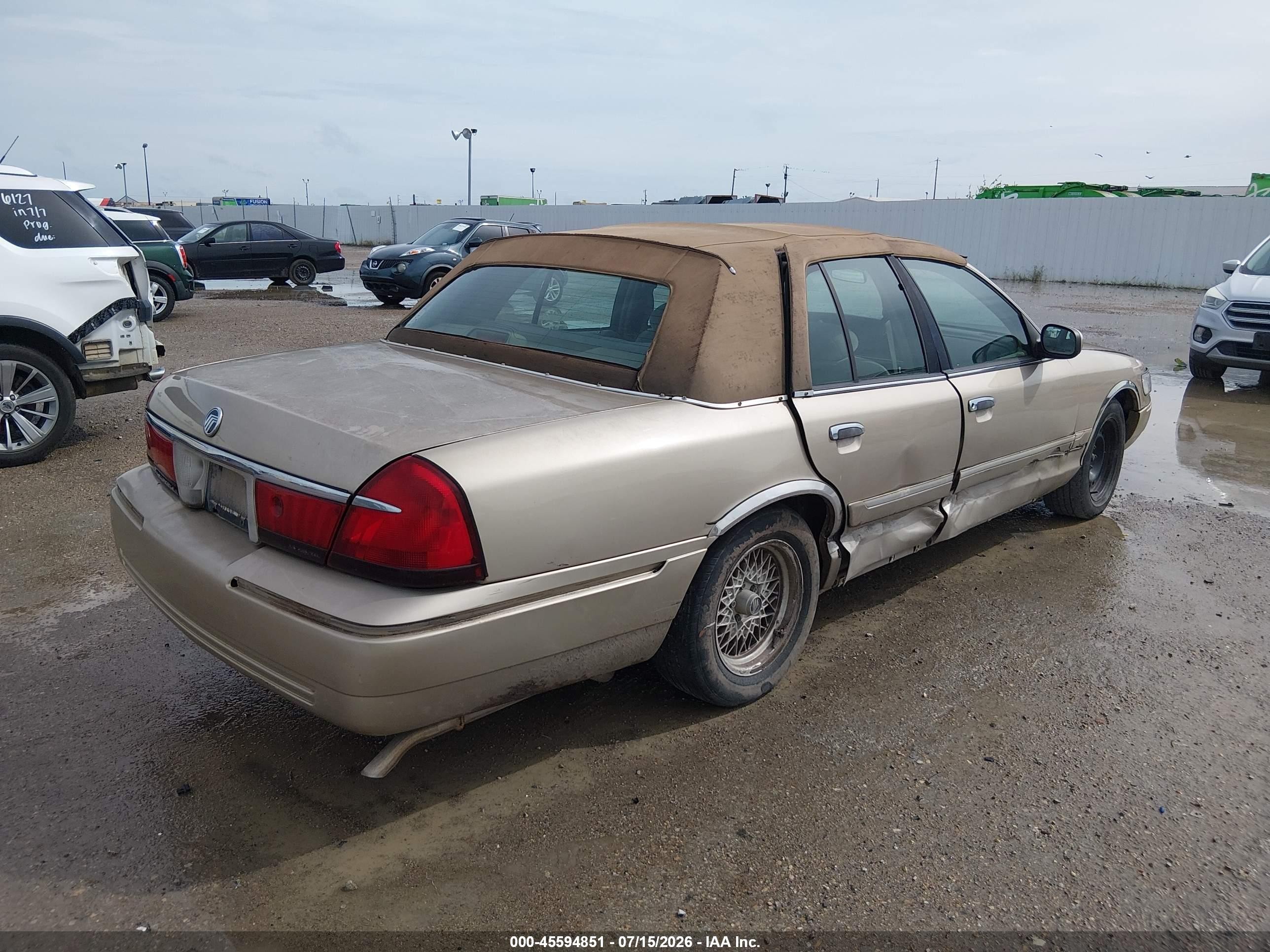 1999 Mercury Grand Marquis Gs Champagne vin: 2MEFM74W1XX689577