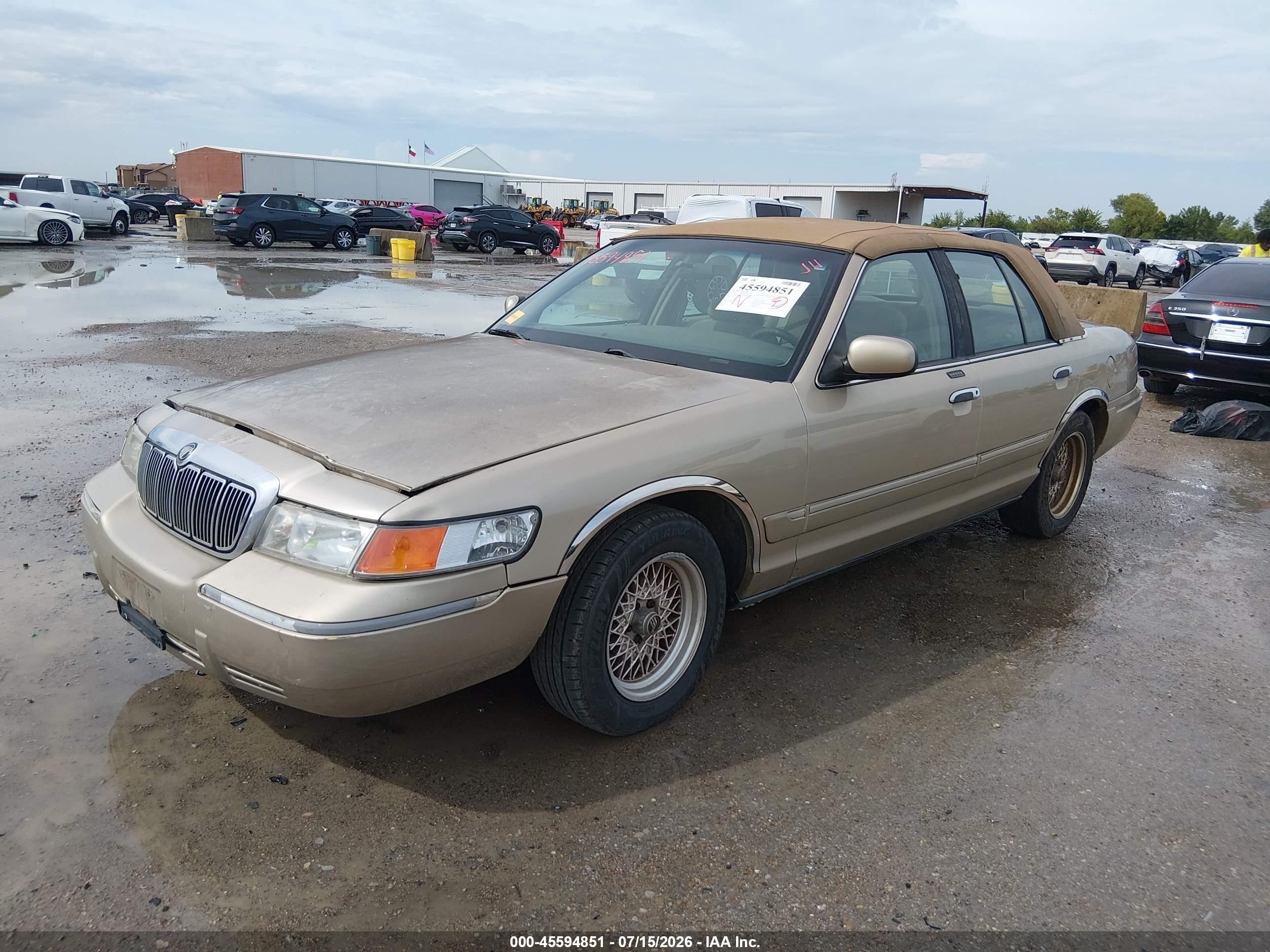 1999 Mercury Grand Marquis Gs Champagne vin: 2MEFM74W1XX689577