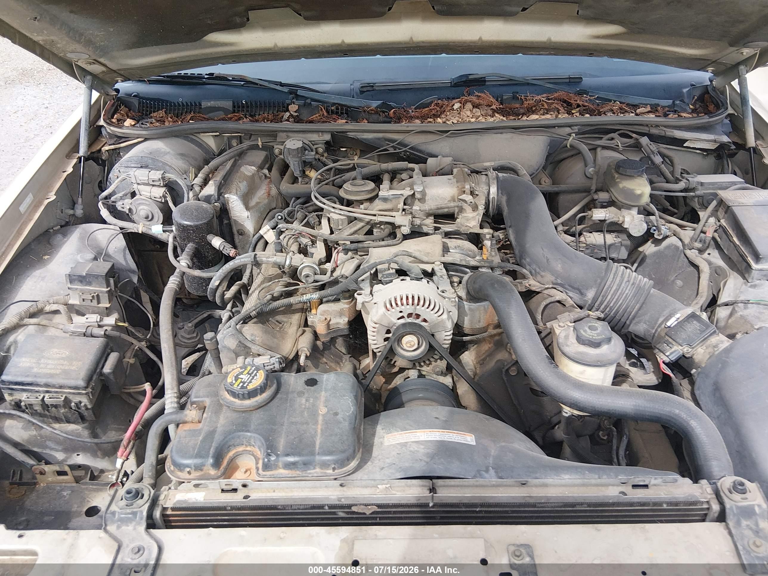 1999 Mercury Grand Marquis Gs Champagne vin: 2MEFM74W1XX689577
