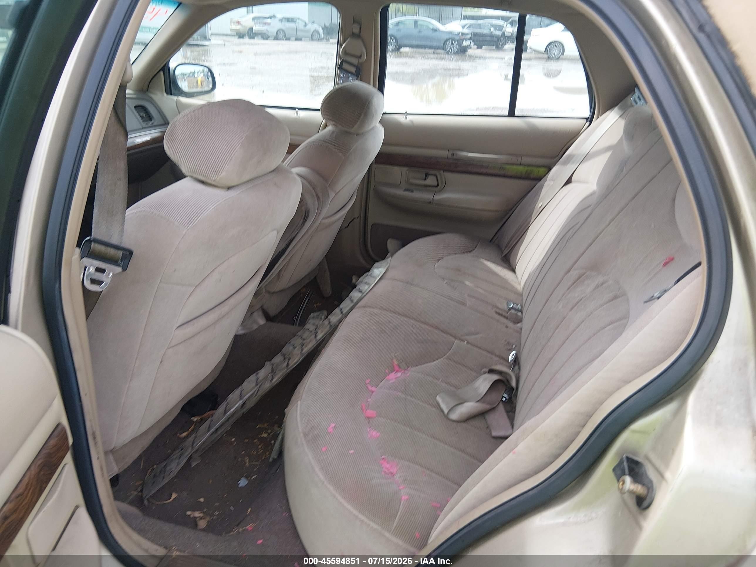1999 Mercury Grand Marquis Gs Champagne vin: 2MEFM74W1XX689577