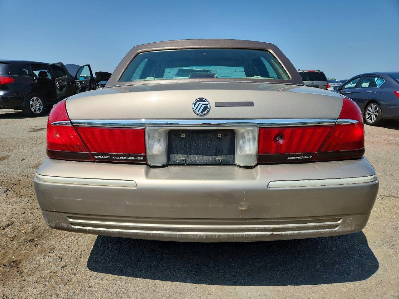 2001 Mercury Grand Marquis Gs Tan vin: 2MEFM74W21X623613