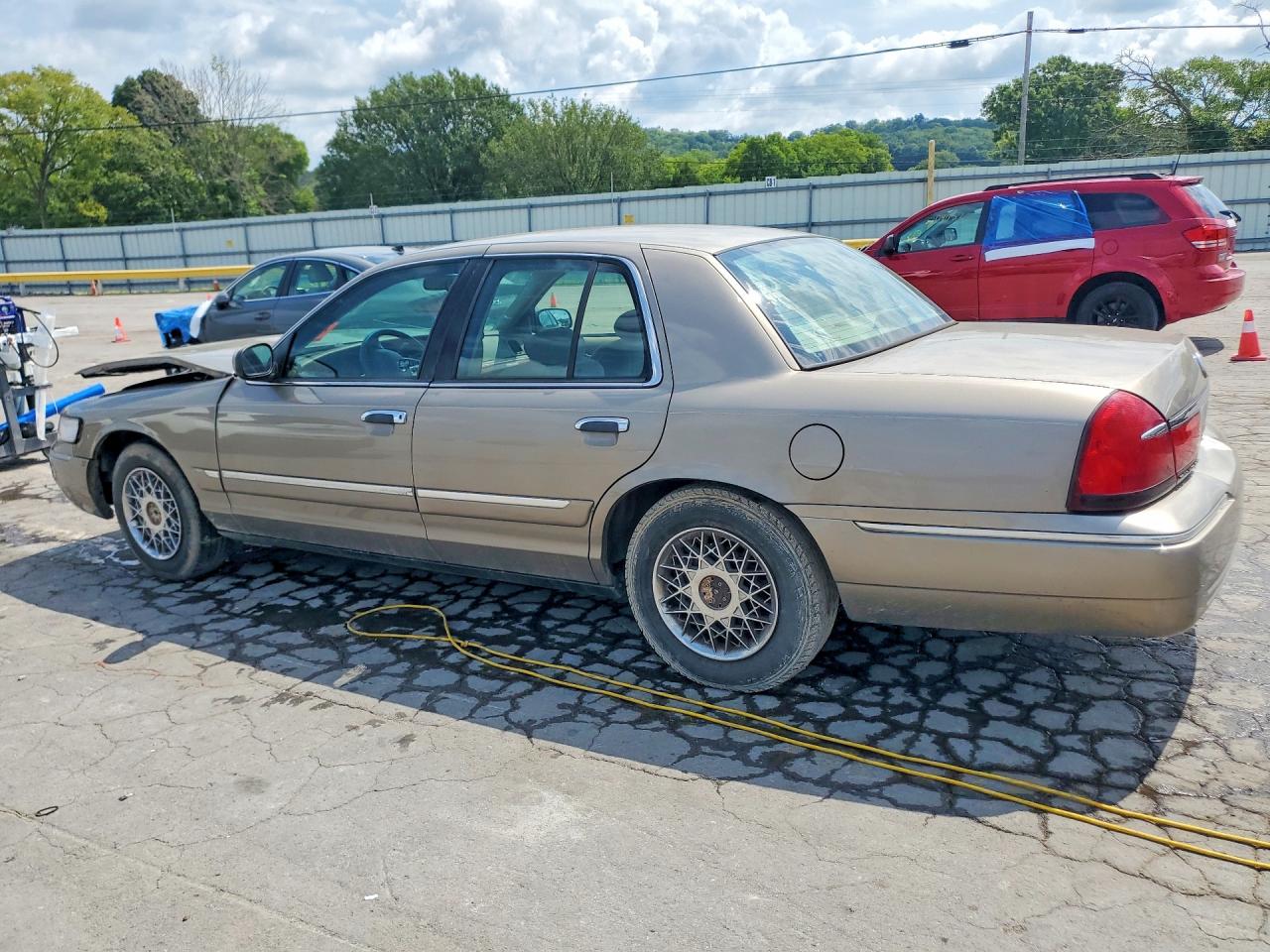 2002 Mercury Grand Marquis Gs Tan vin: 2MEFM74W22X608577