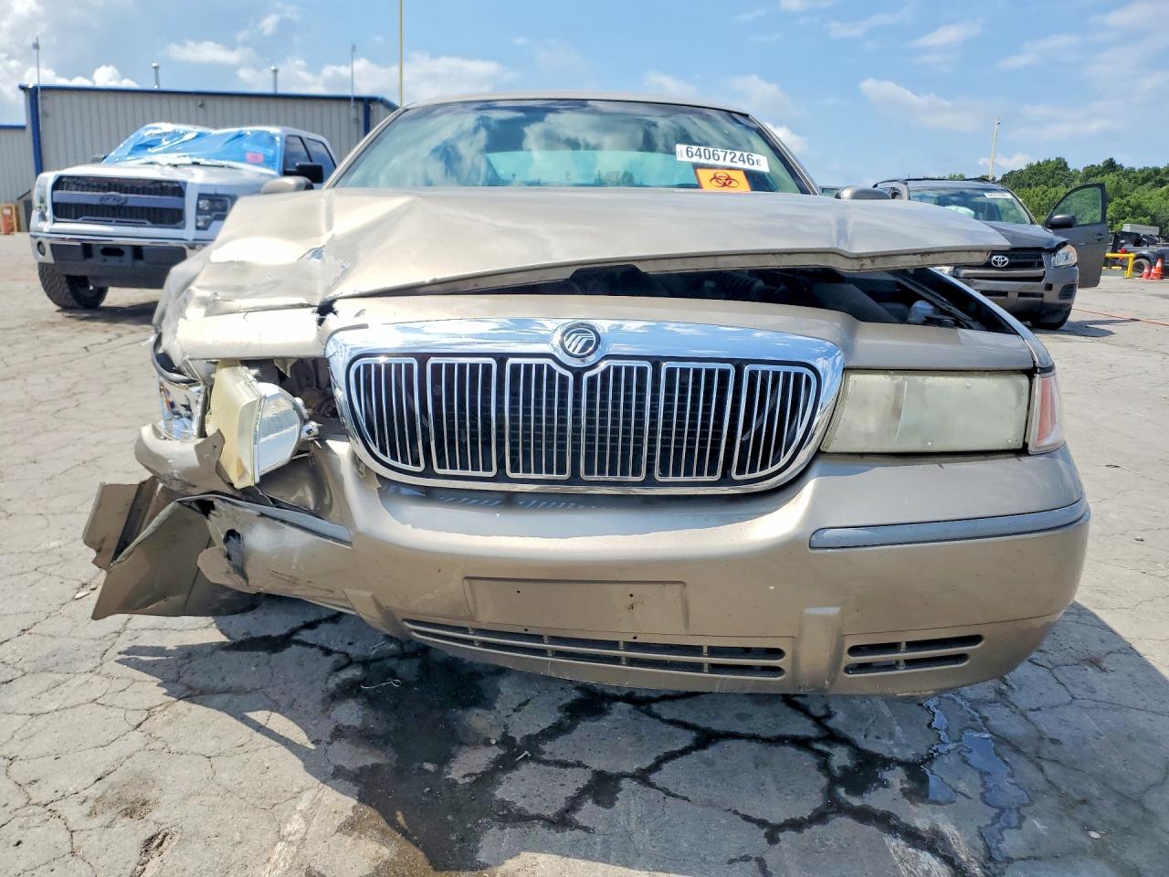 2002 Mercury Grand Marquis Gs Tan vin: 2MEFM74W22X608577