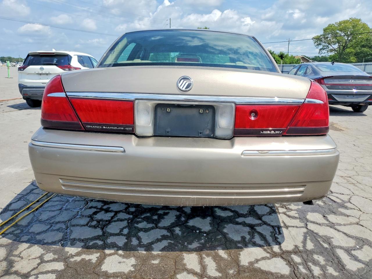 2002 Mercury Grand Marquis Gs Tan vin: 2MEFM74W22X608577