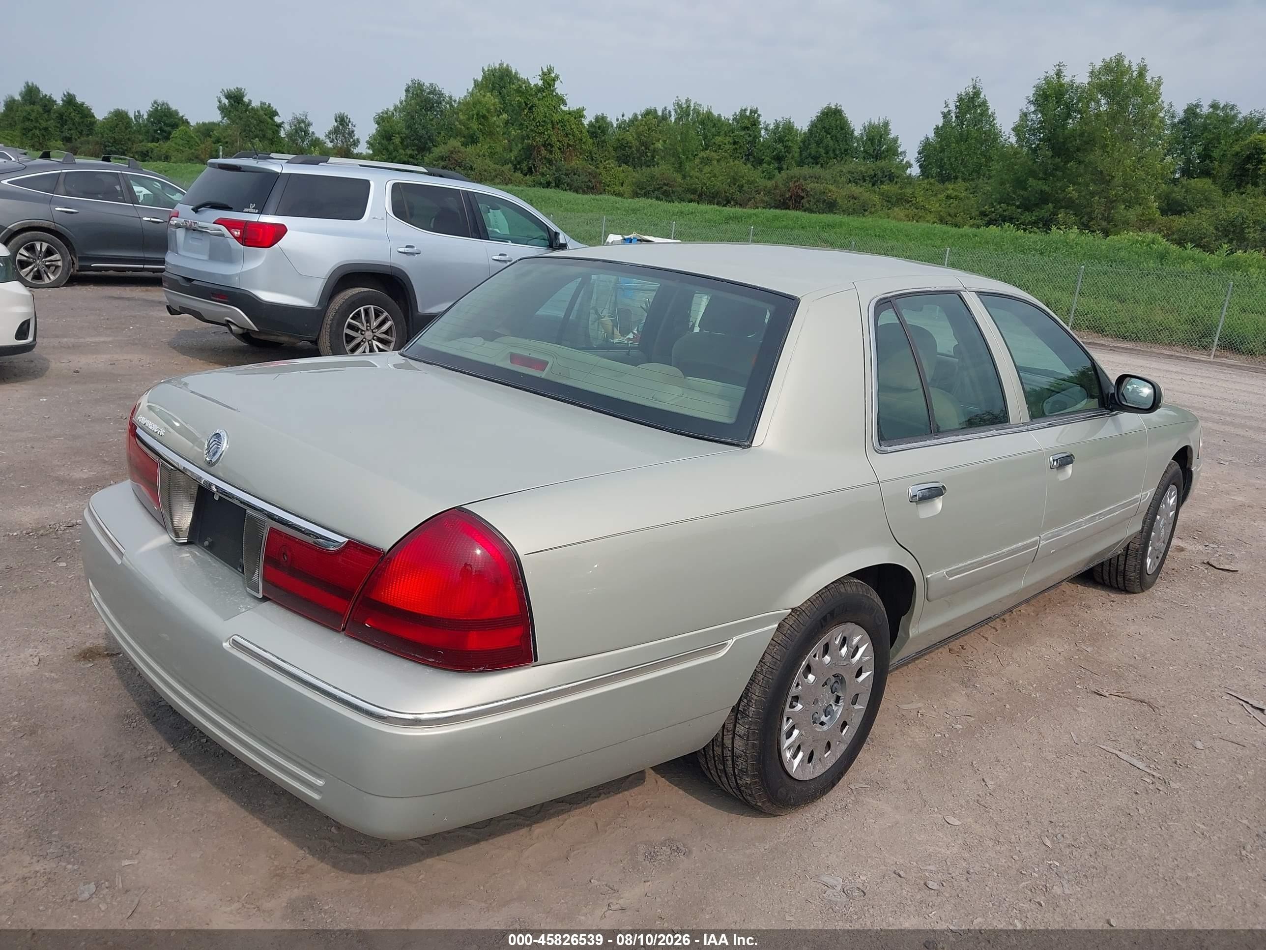 2003 Mercury Grand Marquis Gs Gold vin: 2MEFM74W23X702329
