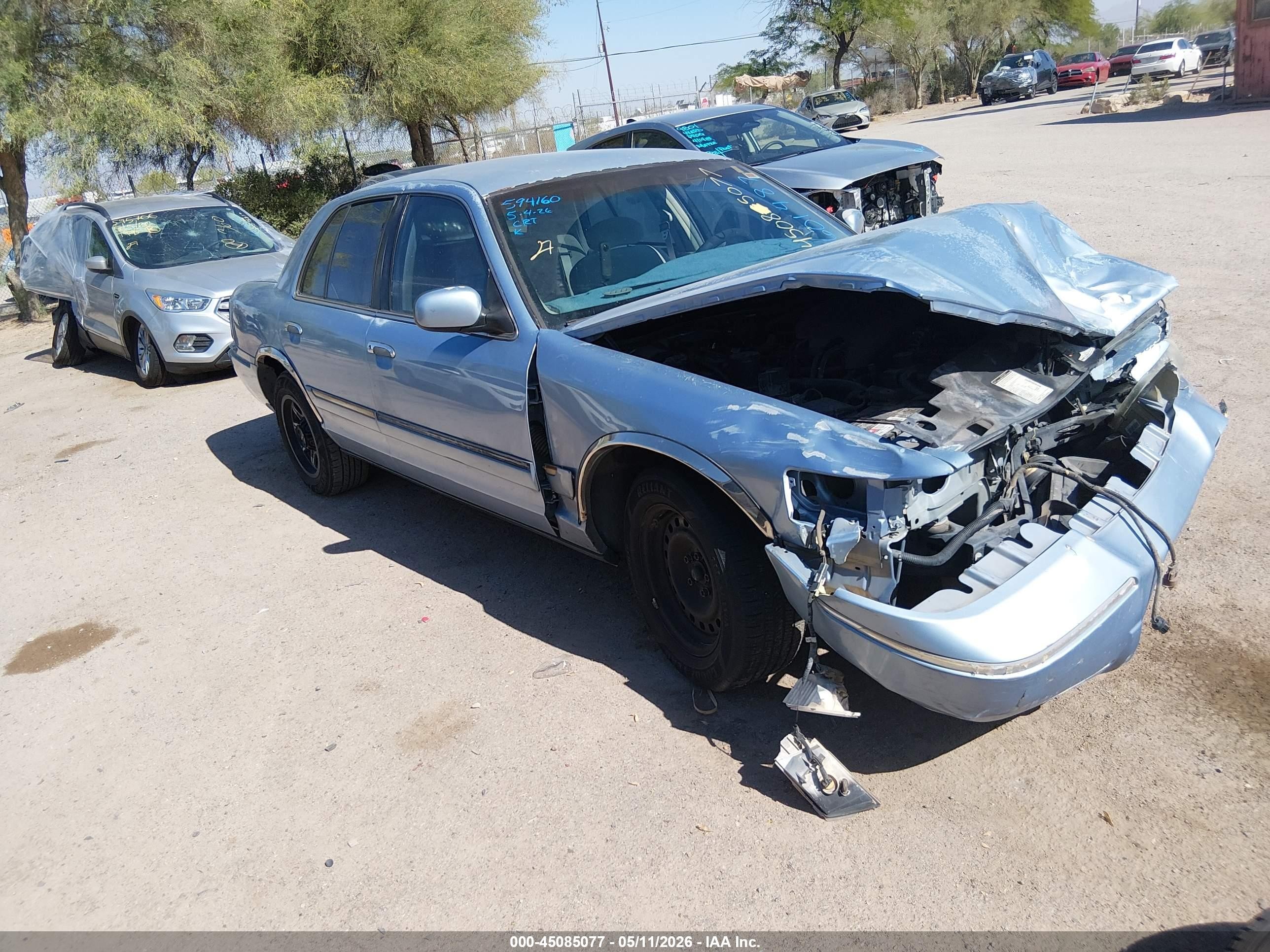 1998 Mercury Grand Marquis   Blue vin: 2MEFM74W2WX601487