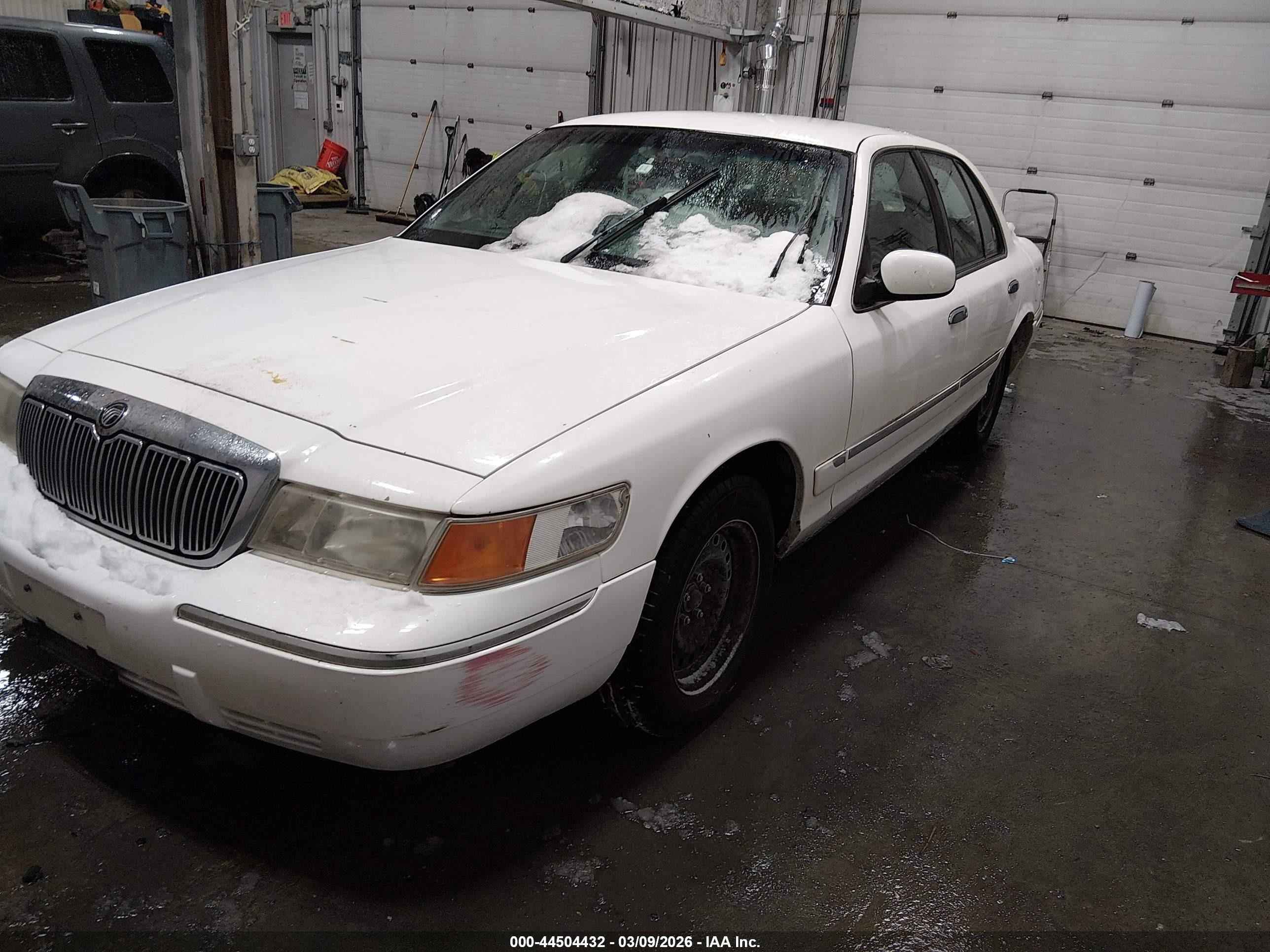 1998 Mercury Grand Marquis   White vin: 2MEFM74W2WX663715