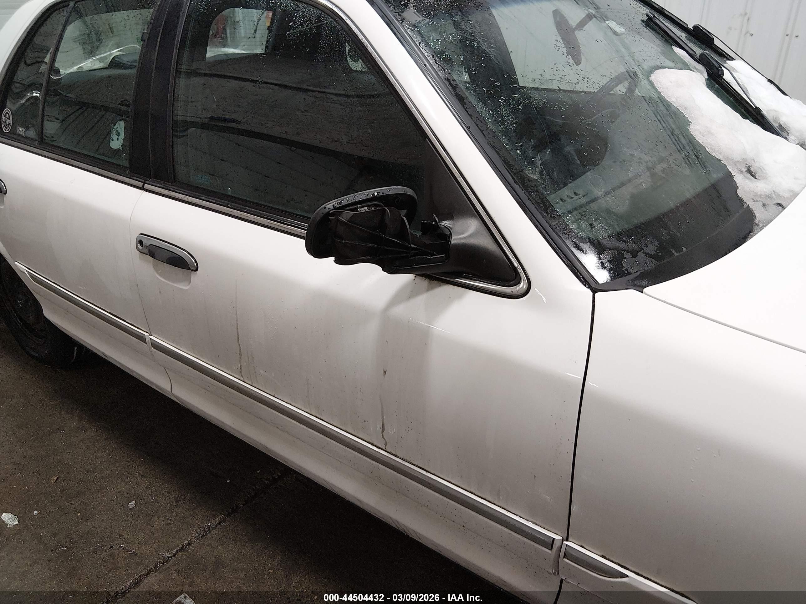 1998 Mercury Grand Marquis   White vin: 2MEFM74W2WX663715