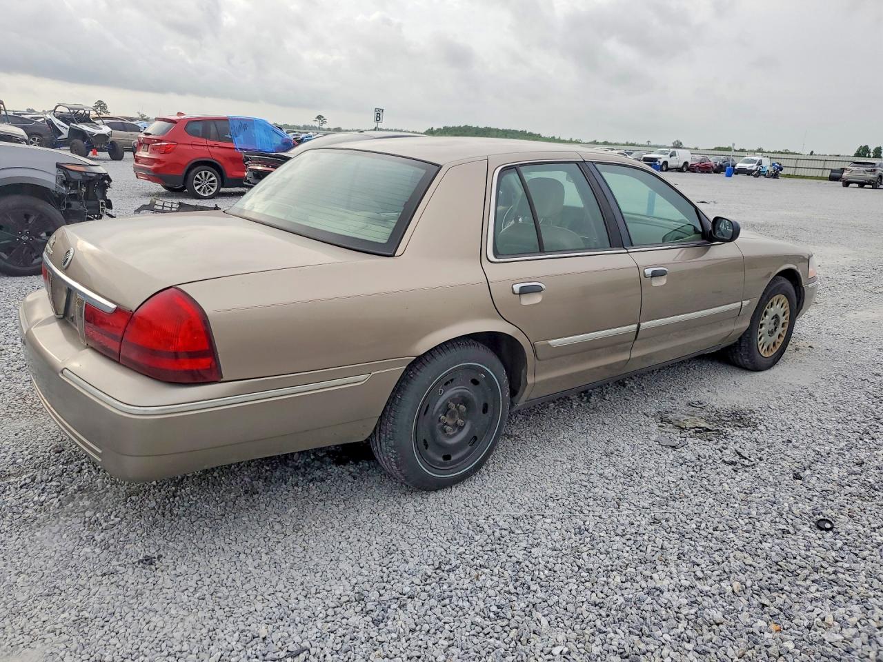 2003 Mercury Grand Marquis Gs Gold vin: 2MEFM74W43X653599