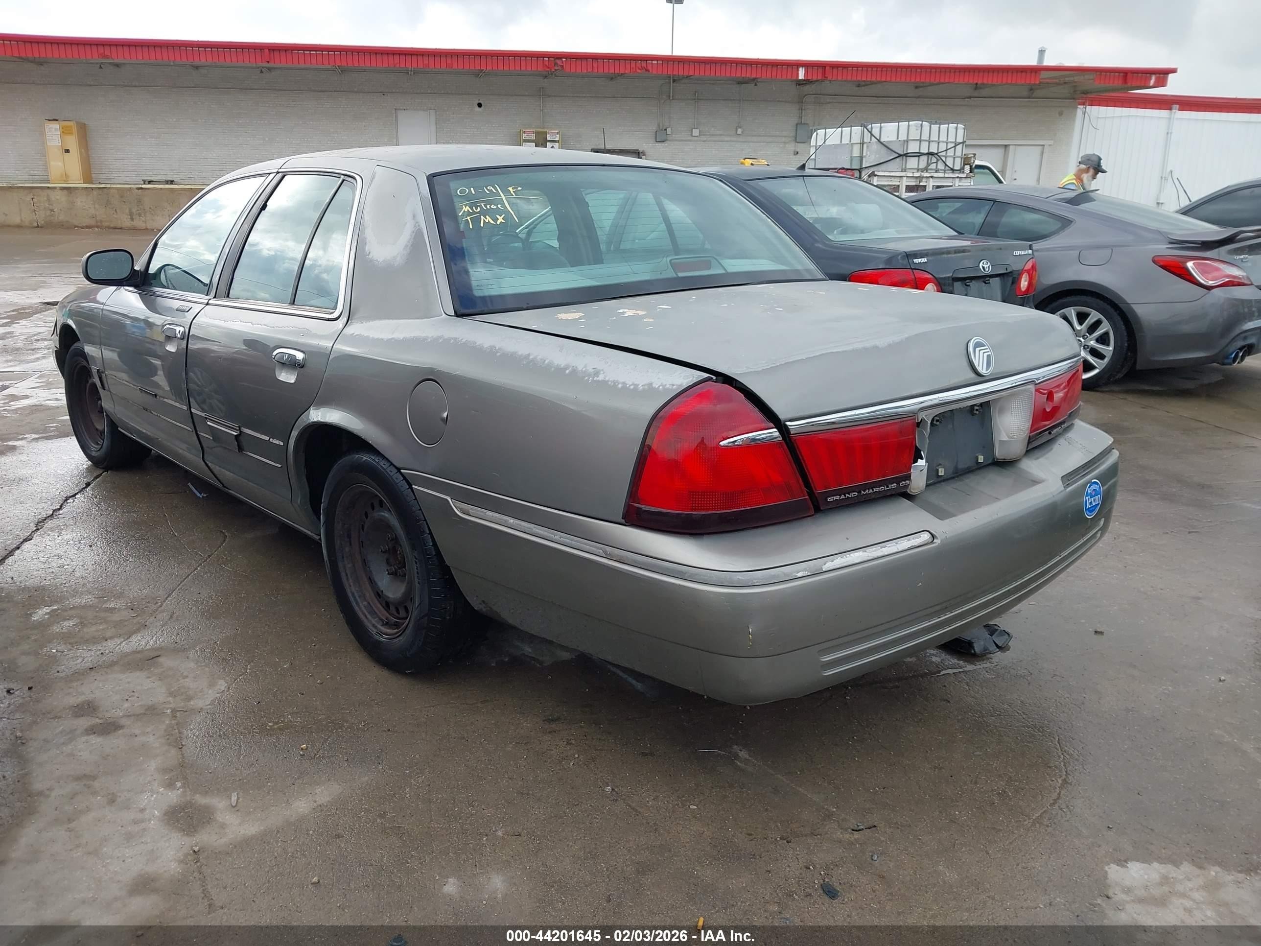 1998 Mercury Grand Marquis   Brown vin: 2MEFM74W4WX606111