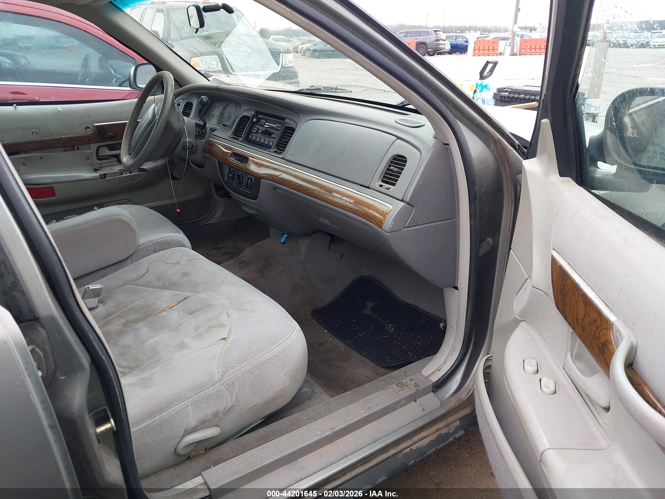 1998 Mercury Grand Marquis   Brown vin: 2MEFM74W4WX606111