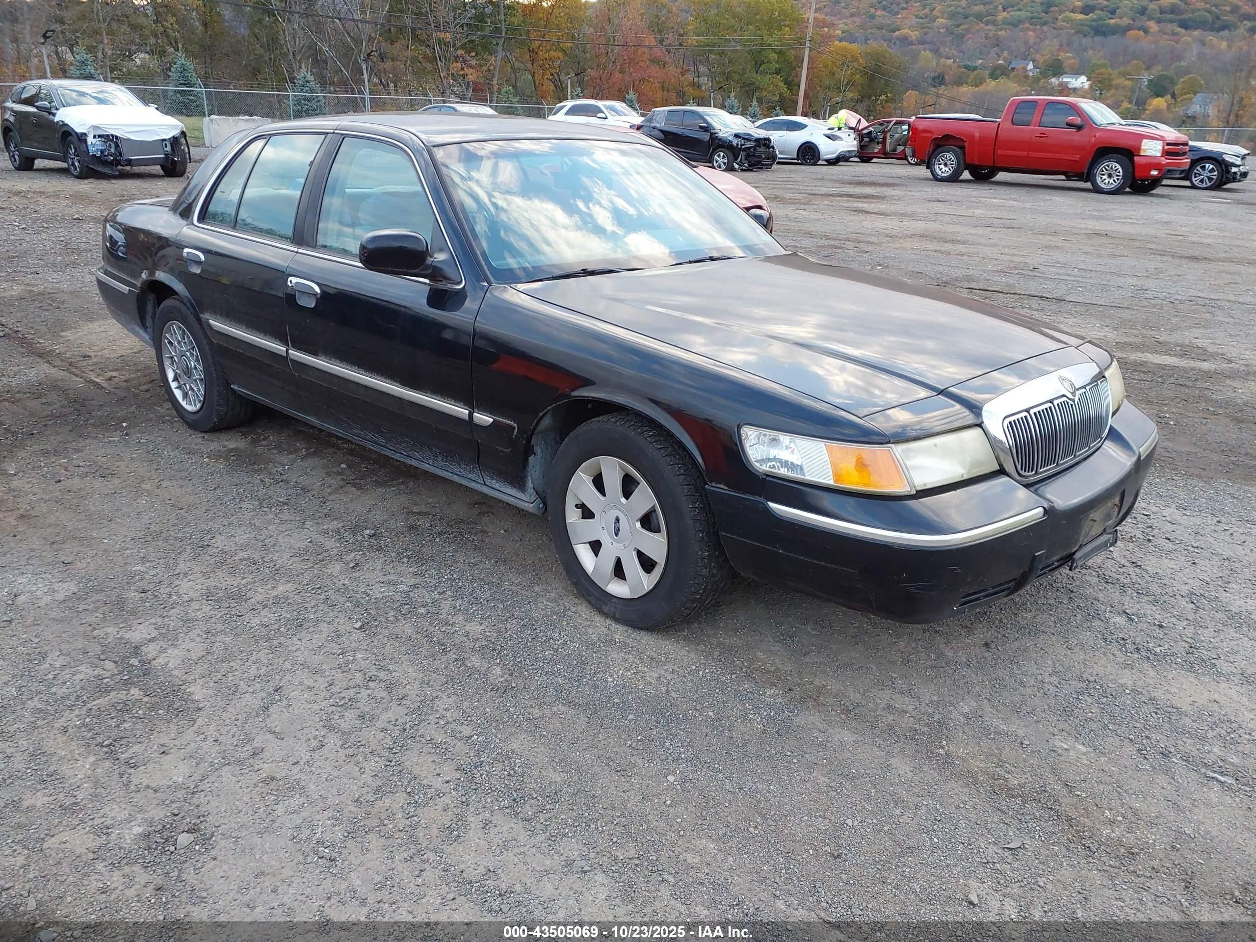 1998 Mercury Grand Marquis   Black vin: 2MEFM74W4WX640730