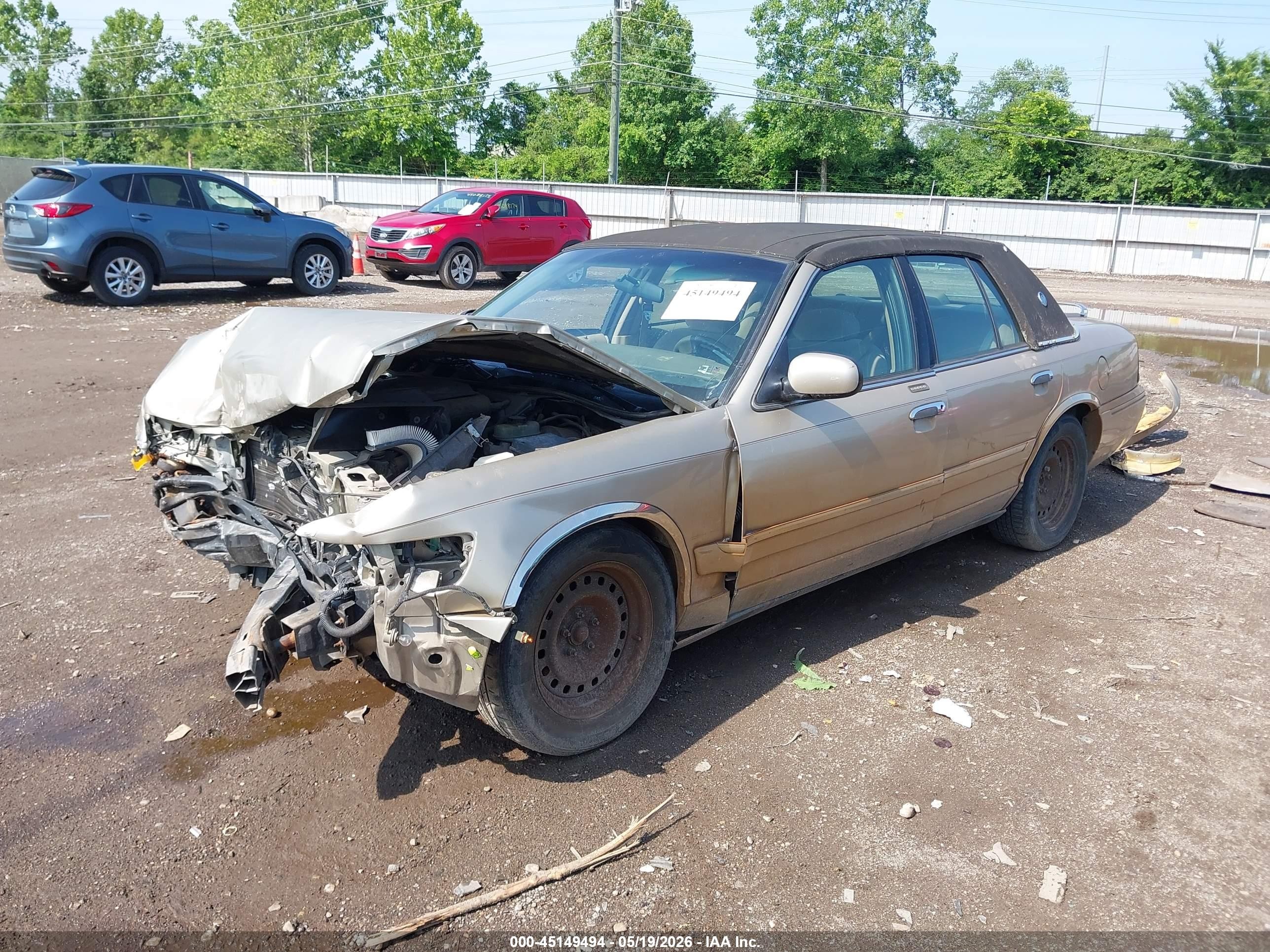 2000 Mercury Grand Marquis Gs Tan vin: 2MEFM74W4YX682642