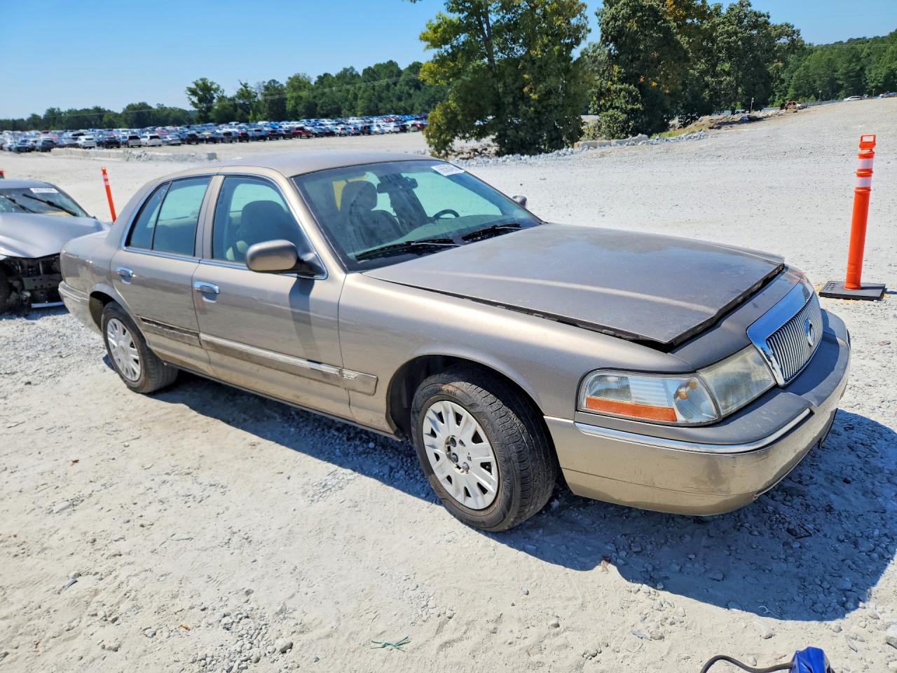 2004 Mercury Grand Marquis Gs Tan vin: 2MEFM74W54X654956