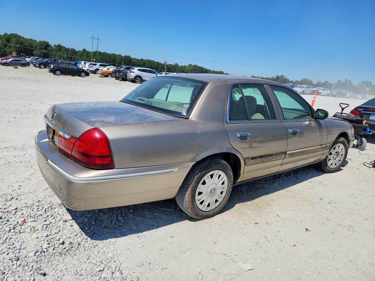 2004 Mercury Grand Marquis Gs Tan vin: 2MEFM74W54X654956