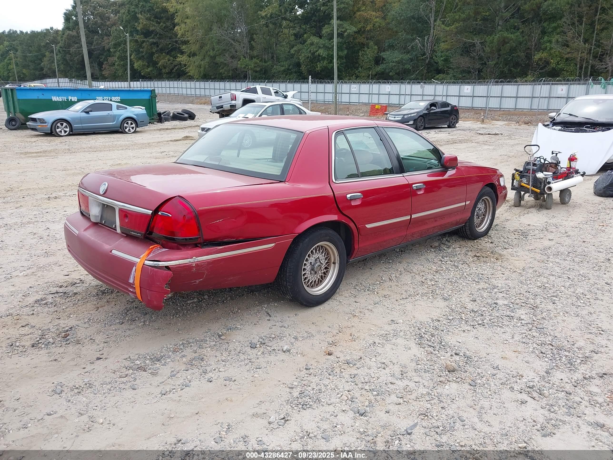 1998 Mercury Grand Marquis   Orange vin: 2MEFM74W5WX606621