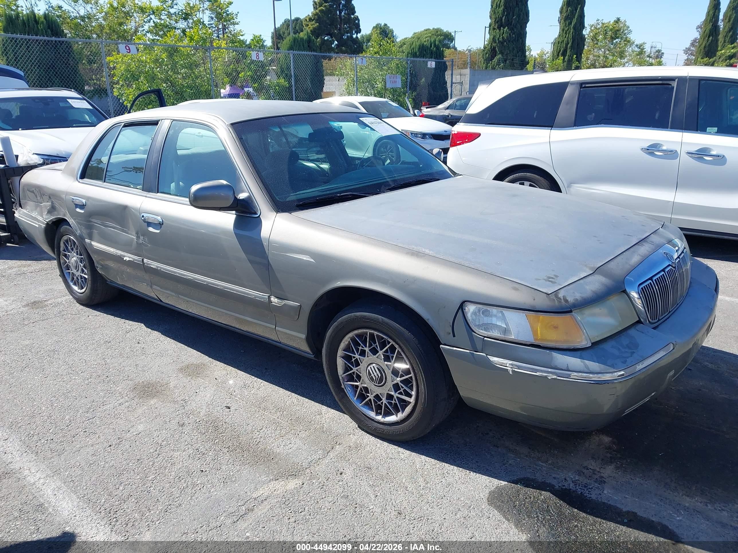 1998 Mercury Grand Marquis   Silver vin: 2MEFM74W5WX620728