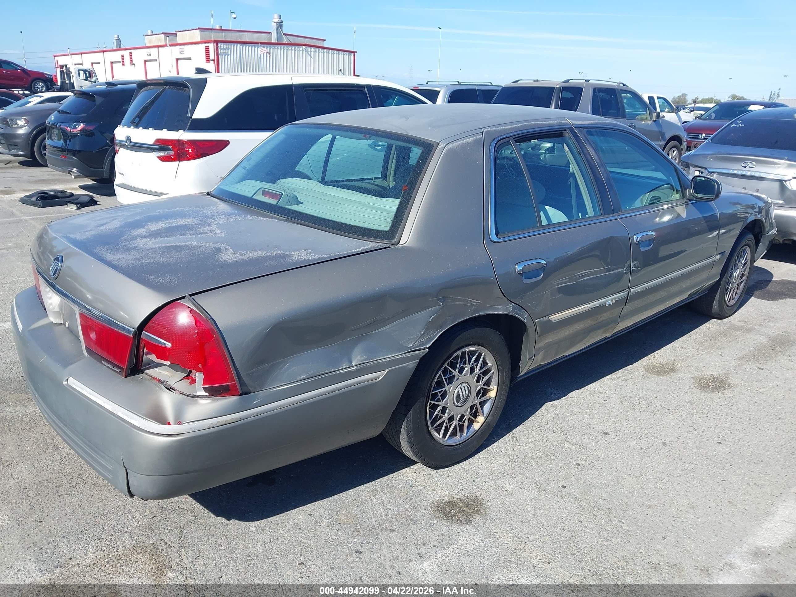 1998 Mercury Grand Marquis   Silver vin: 2MEFM74W5WX620728