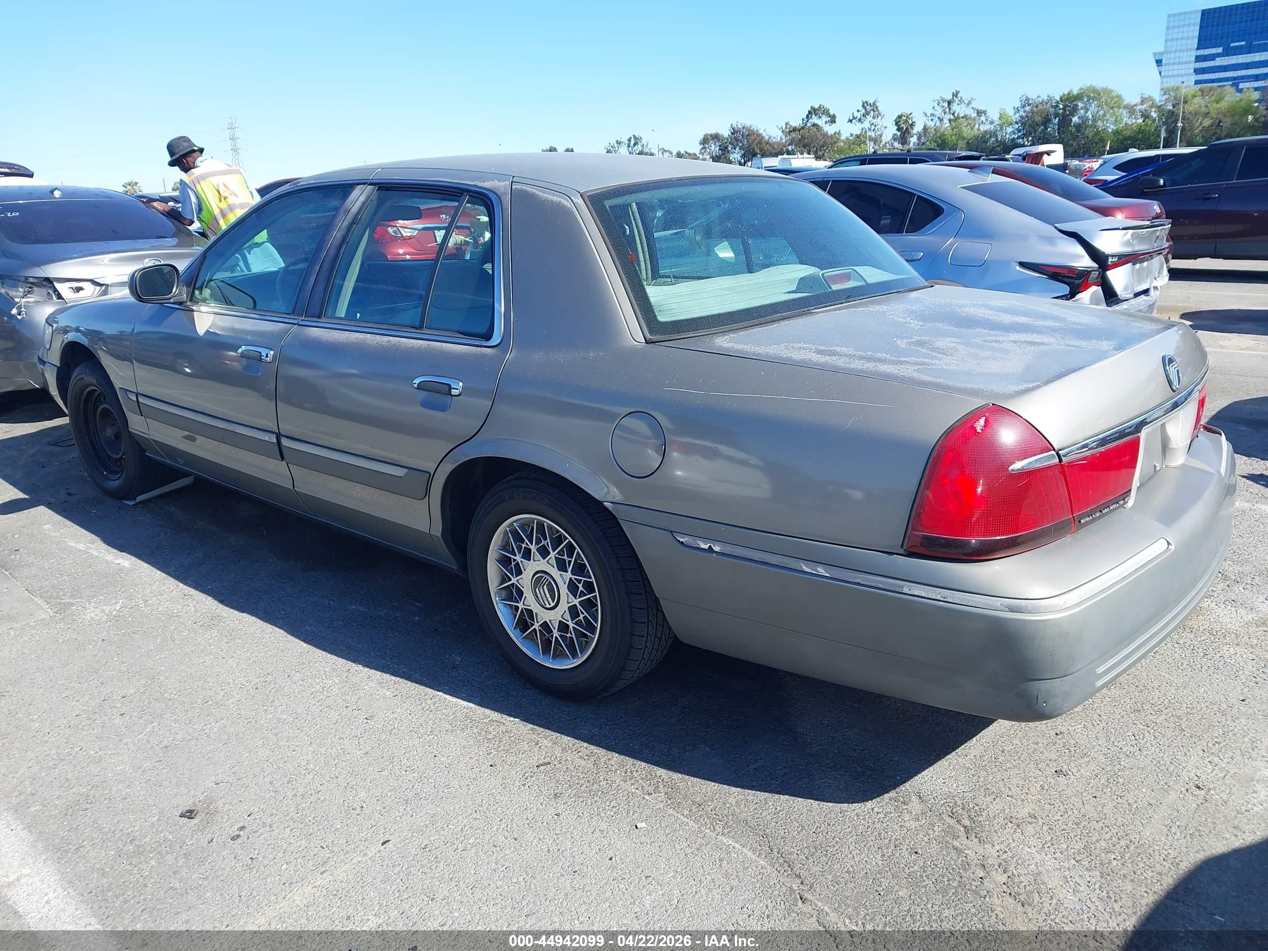 1998 Mercury Grand Marquis   Silver vin: 2MEFM74W5WX620728