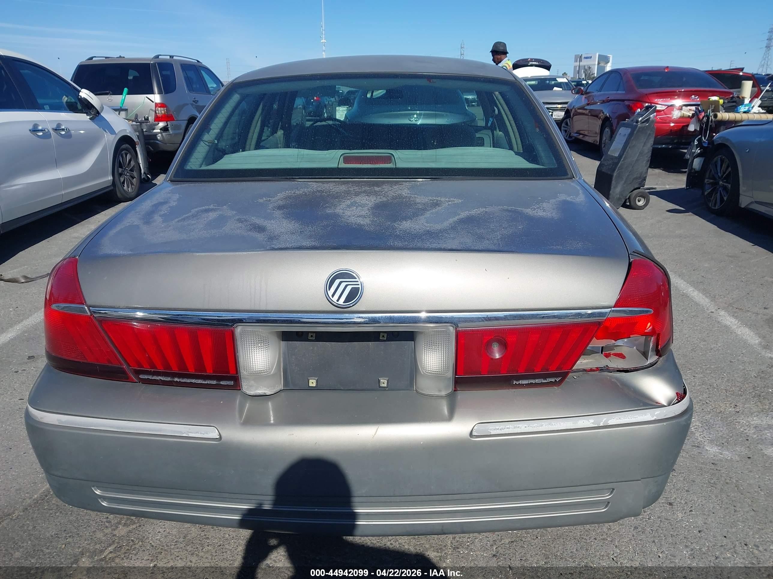 1998 Mercury Grand Marquis   Silver vin: 2MEFM74W5WX620728