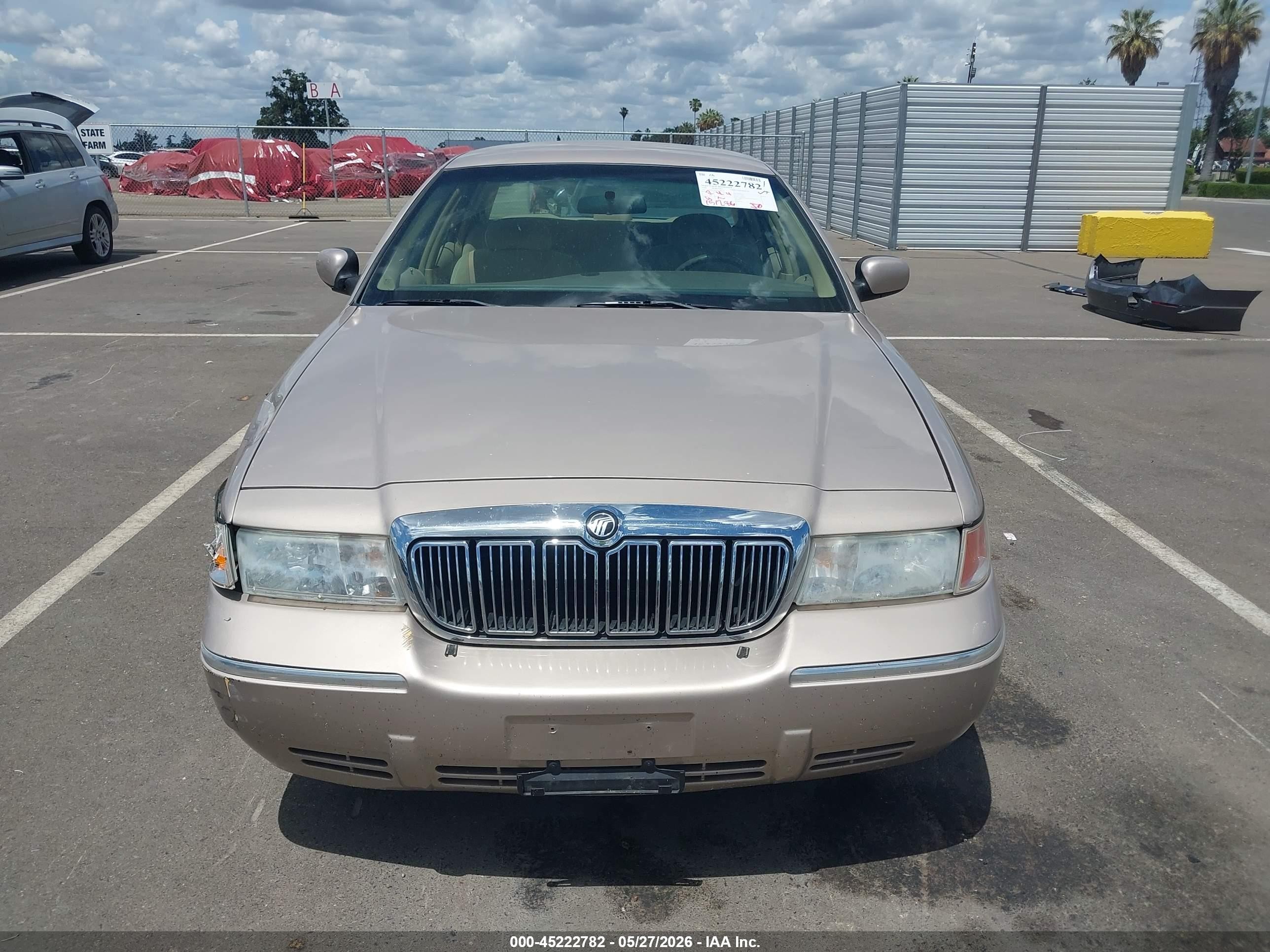 1998 Mercury Grand Marquis   Tan vin: 2MEFM74W5WX646522
