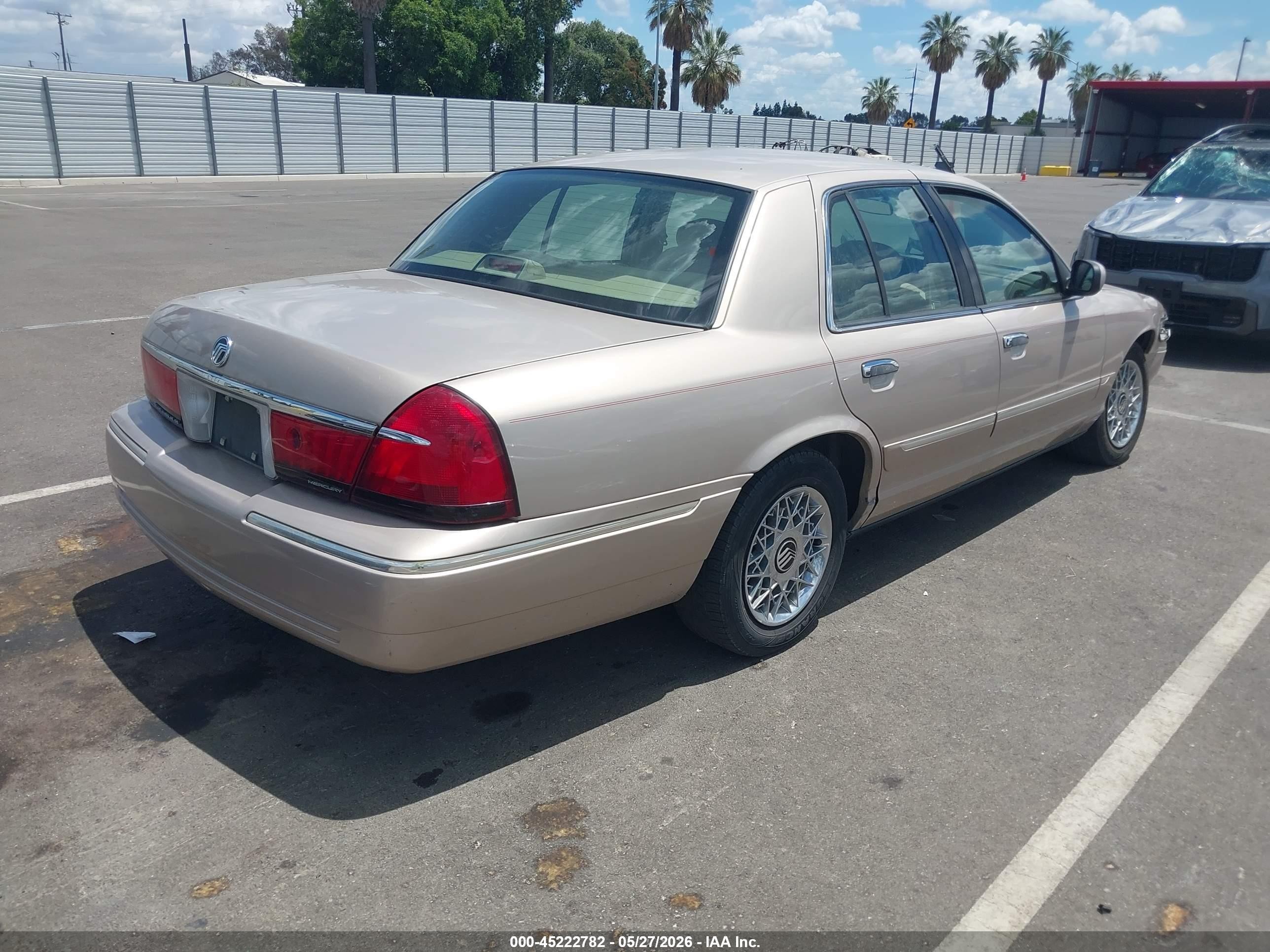 1998 Mercury Grand Marquis   Tan vin: 2MEFM74W5WX646522