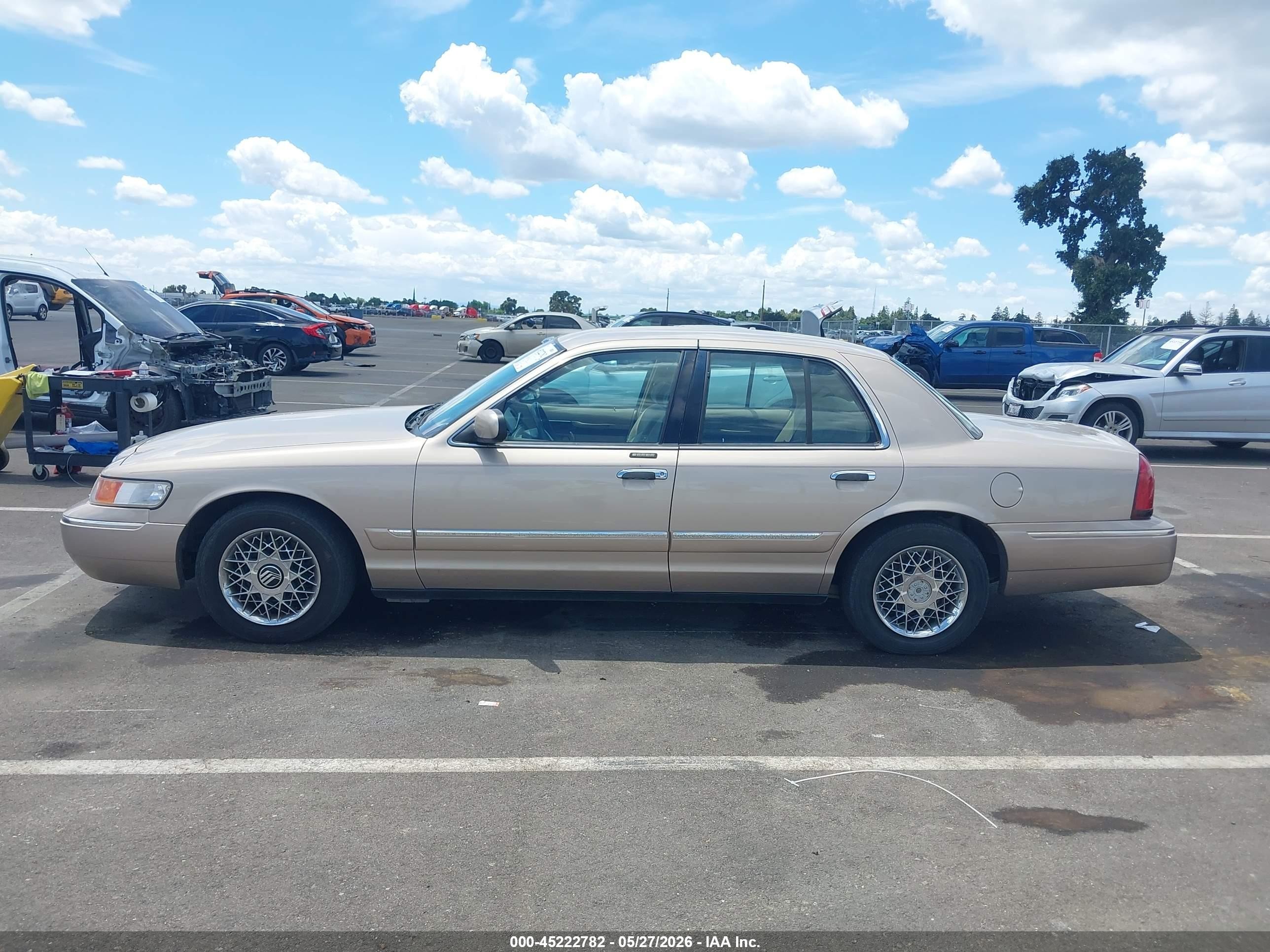1998 Mercury Grand Marquis   Tan vin: 2MEFM74W5WX646522