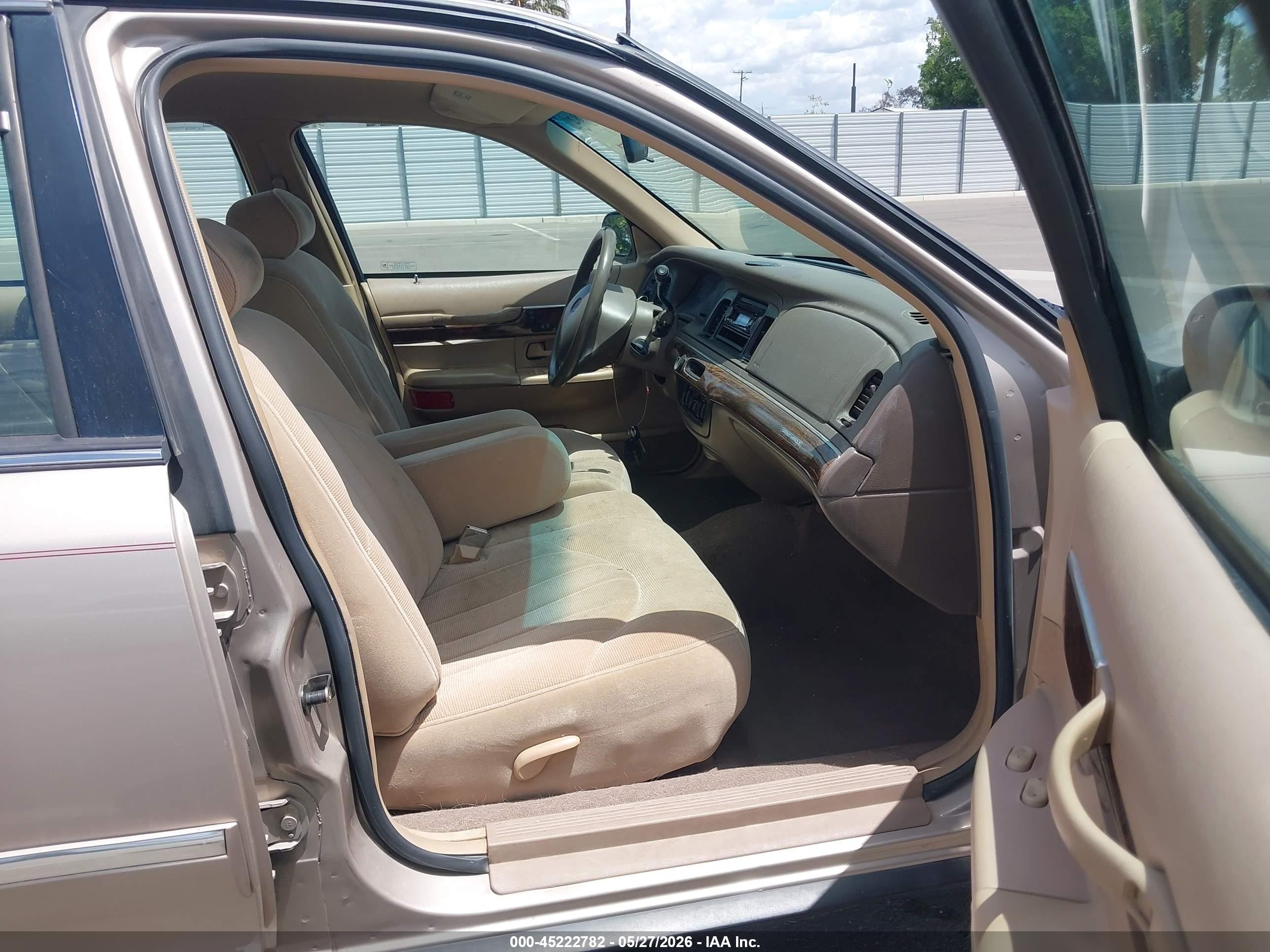 1998 Mercury Grand Marquis   Tan vin: 2MEFM74W5WX646522