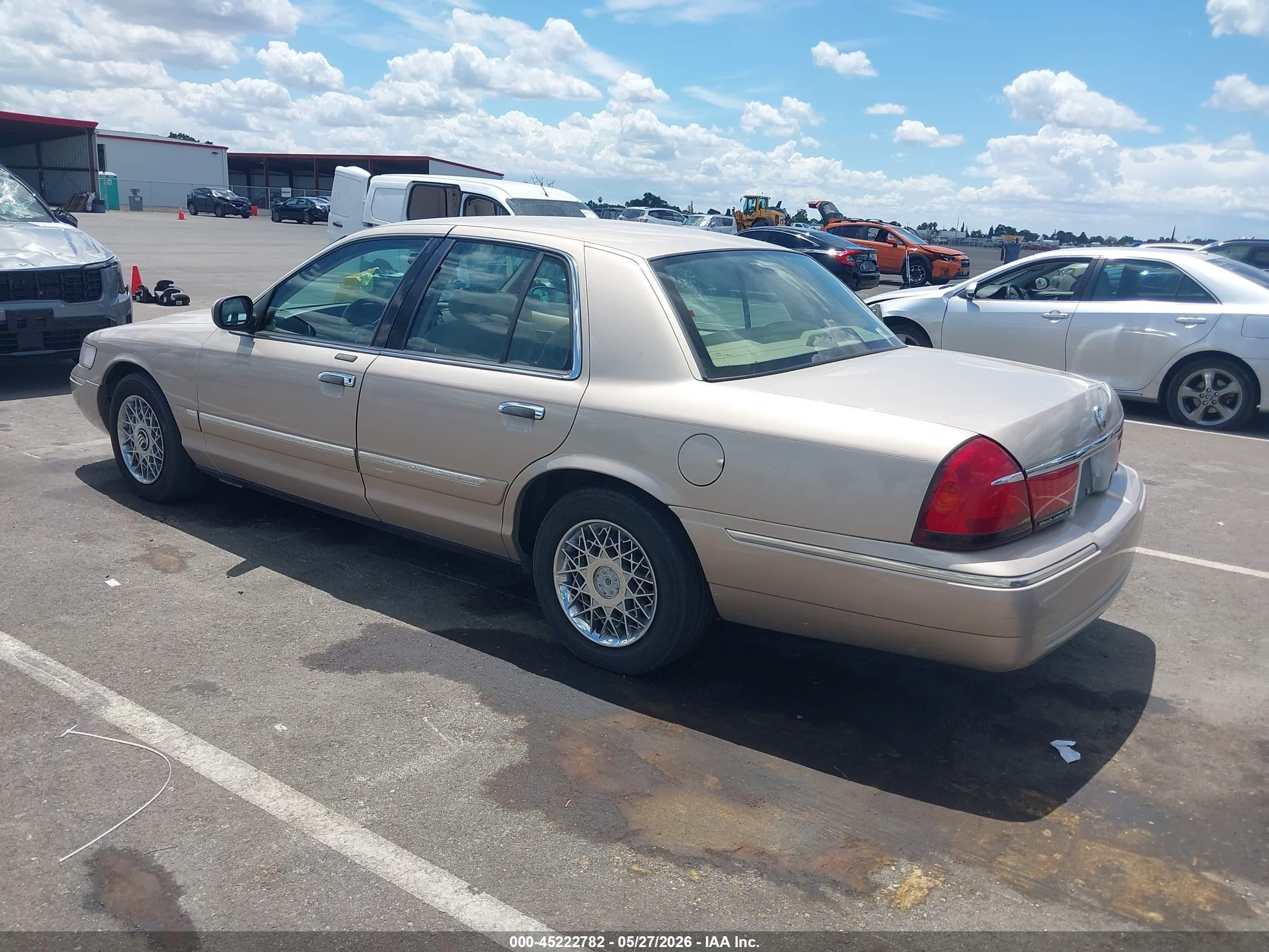 1998 Mercury Grand Marquis   Tan vin: 2MEFM74W5WX646522