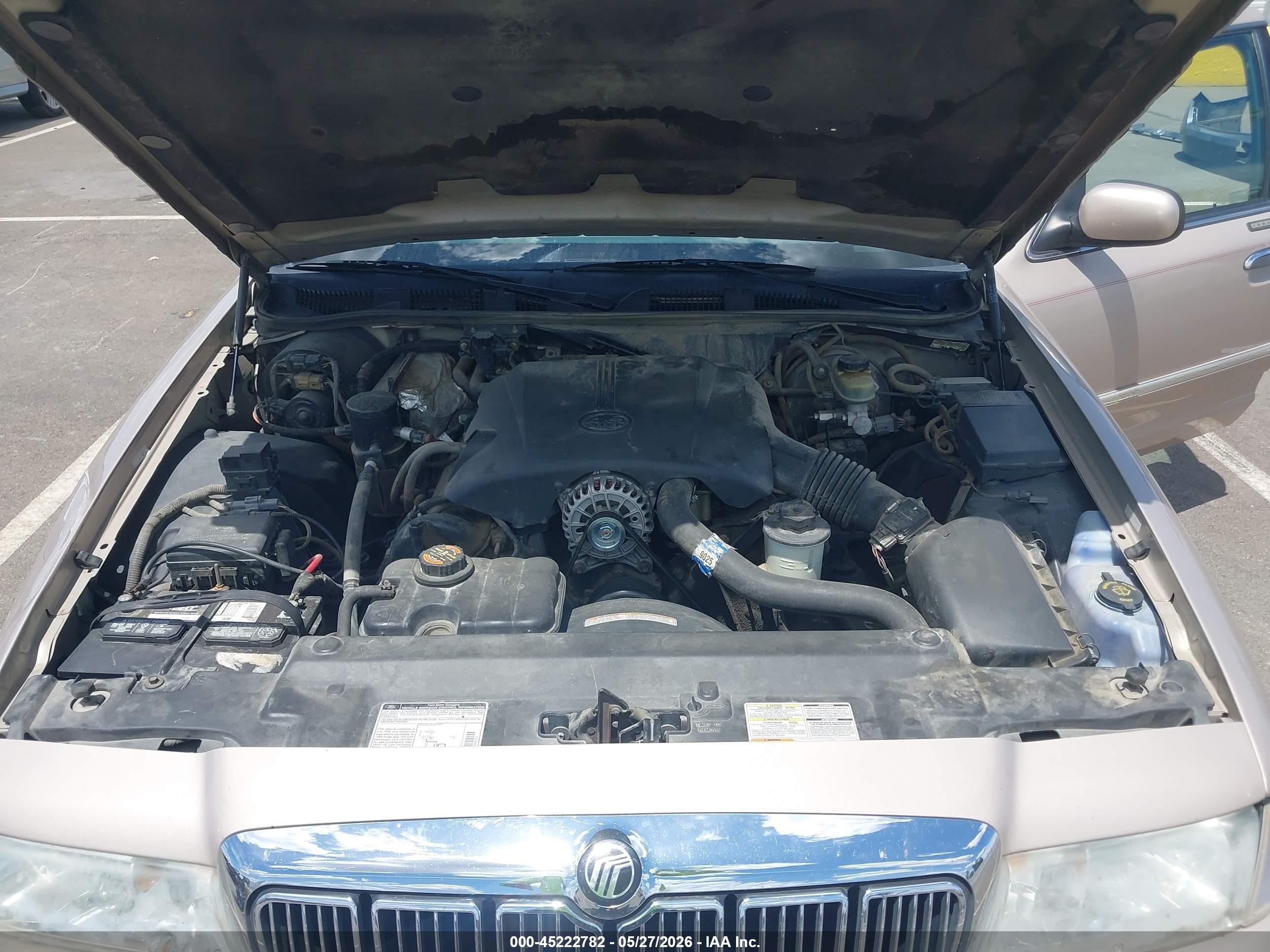 1998 Mercury Grand Marquis   Tan vin: 2MEFM74W5WX646522