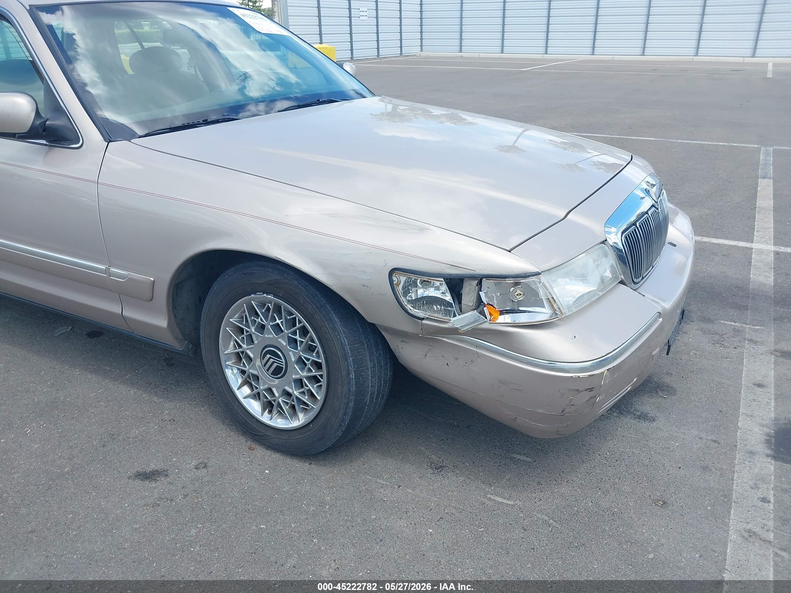 1998 Mercury Grand Marquis   Tan vin: 2MEFM74W5WX646522