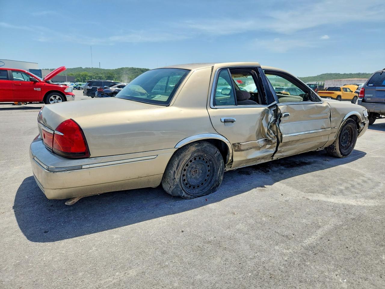 2000 Mercury Grand Marquis Gs Tan vin: 2MEFM74W5YX616939