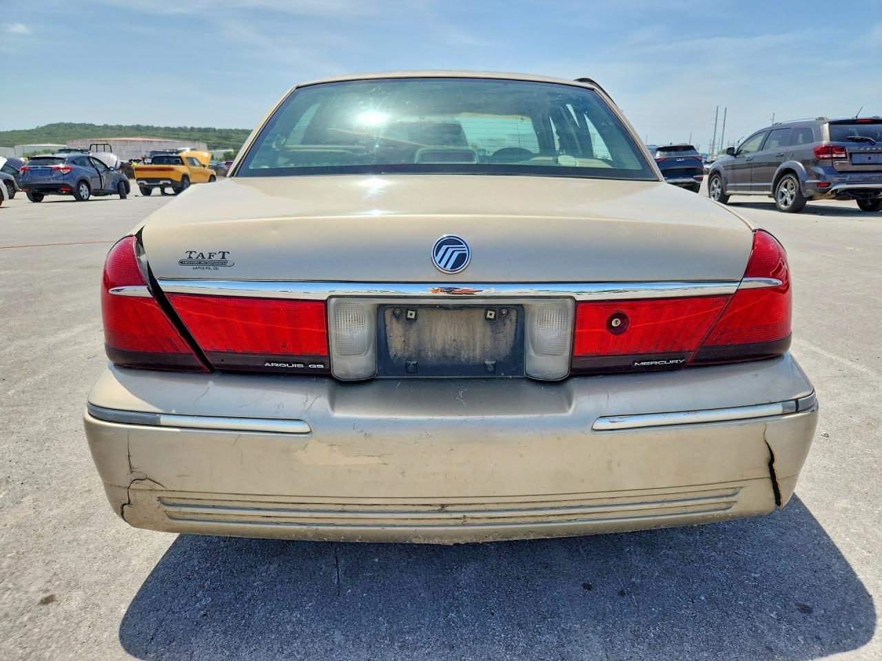 2000 Mercury Grand Marquis Gs Tan vin: 2MEFM74W5YX616939