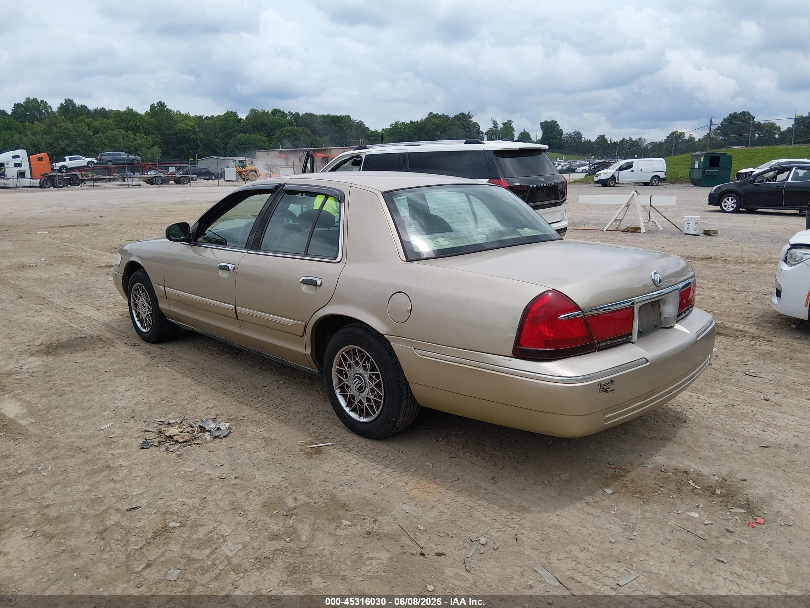 2000 Mercury Grand Marquis Gs Gold vin: 2MEFM74W5YX738989