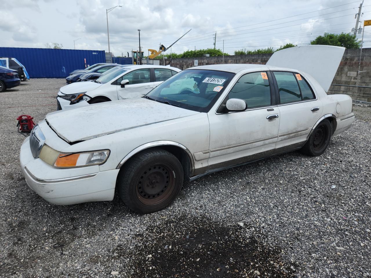 2001 Mercury Grand Marquis Gs White vin: 2MEFM74W61X610329 Damage: Front Bumper/Cover, Scraped, 5 To 6 Inches