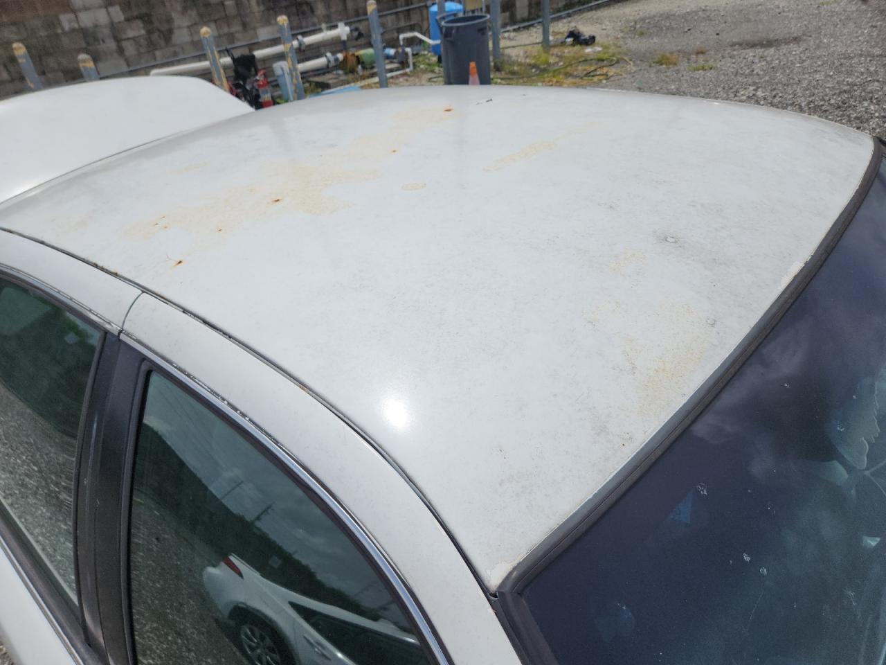 2001 Mercury Grand Marquis Gs White vin: 2MEFM74W61X610329 Damage: Roof, Rust, > 12 Inches