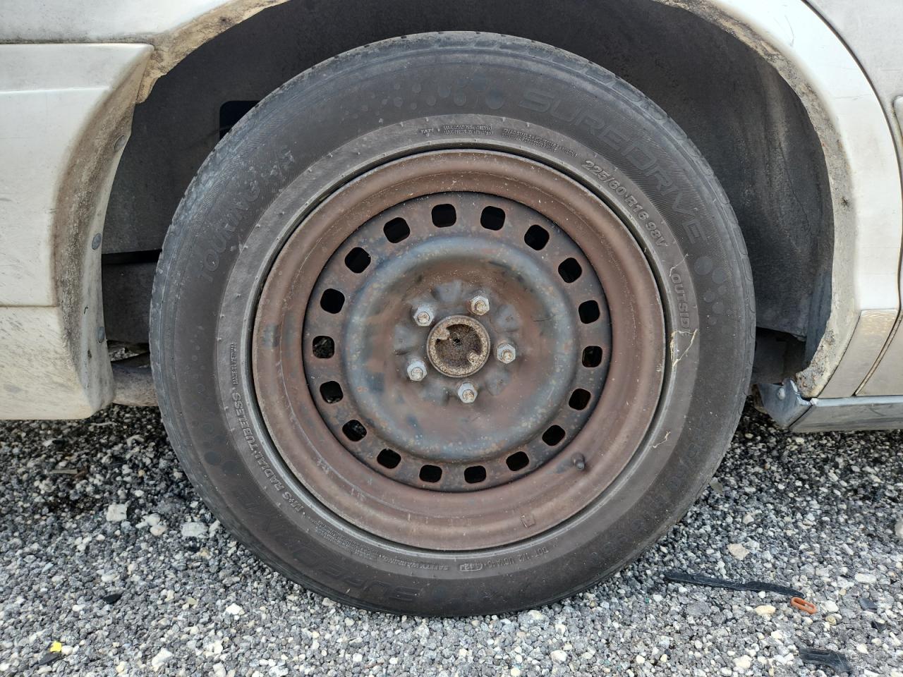 2001 Mercury Grand Marquis Gs White vin: 2MEFM74W61X610329 Damage: Right Rear Wheel Cover, Missing, Replacement Required