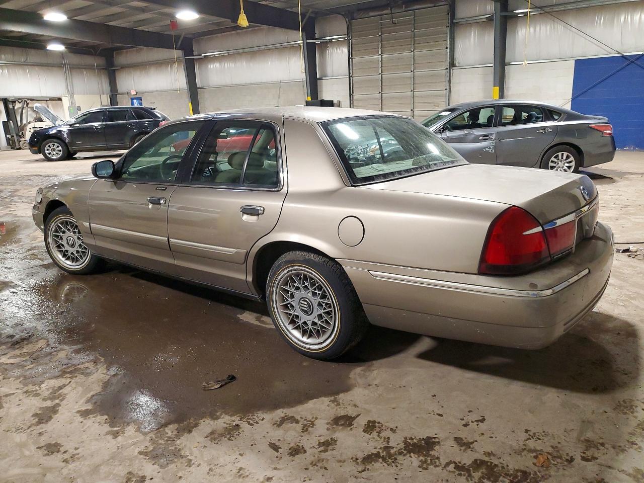 2002 Mercury Grand Marquis Gs Tan vin: 2MEFM74W62X621297