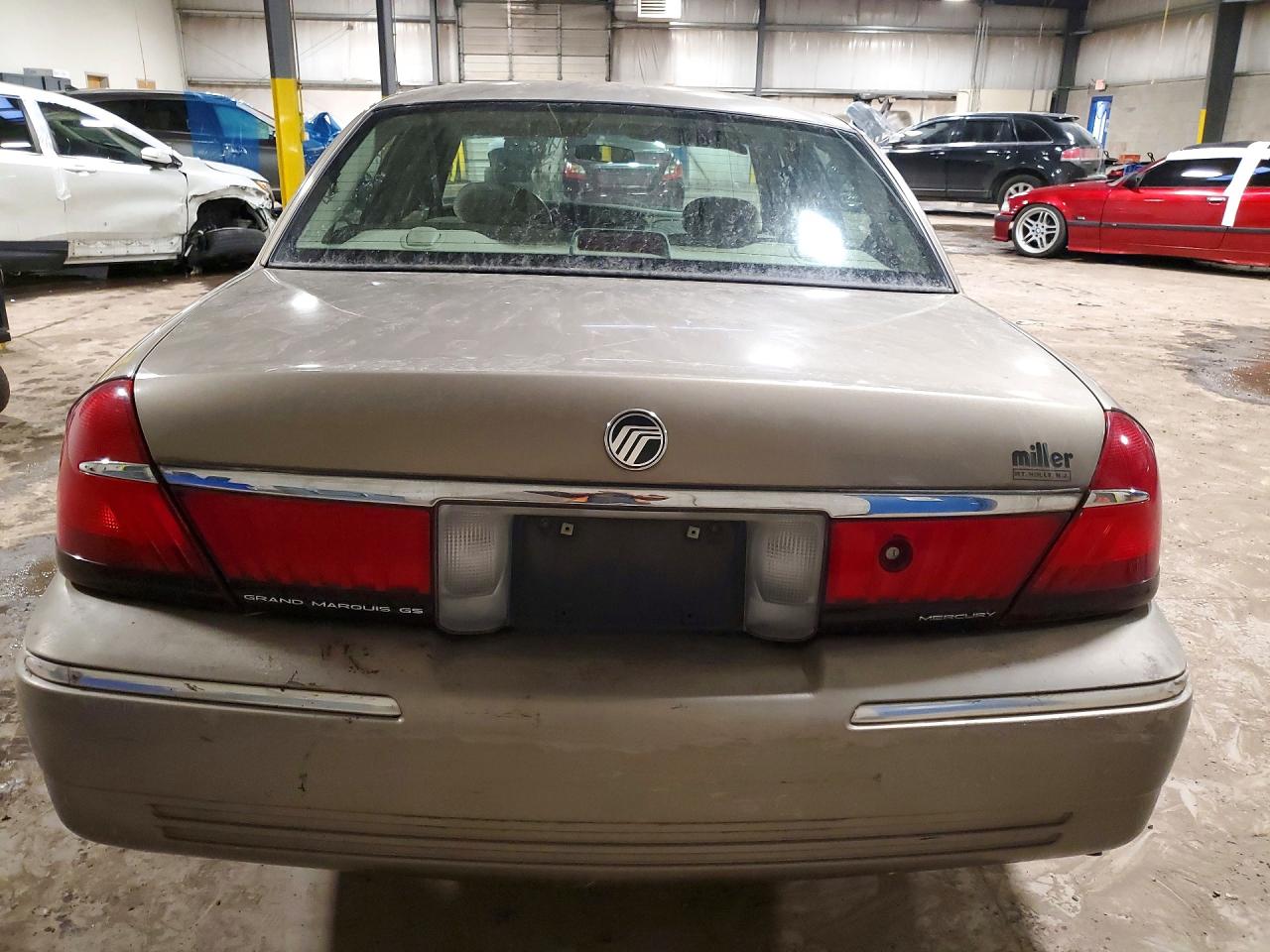 2002 Mercury Grand Marquis Gs Tan vin: 2MEFM74W62X621297
