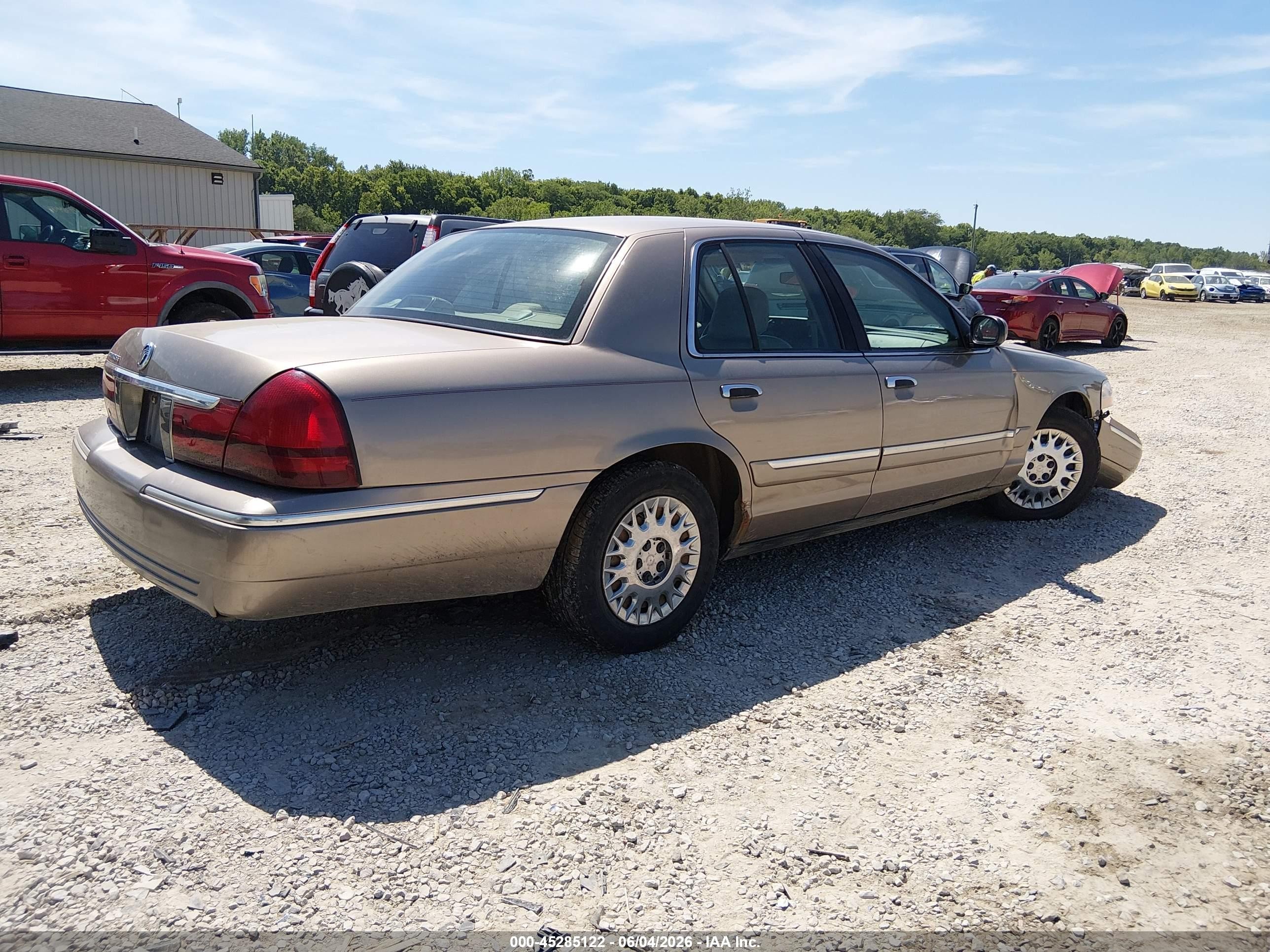 2003 Mercury Grand Marquis Gs Tan vin: 2MEFM74W63X649960