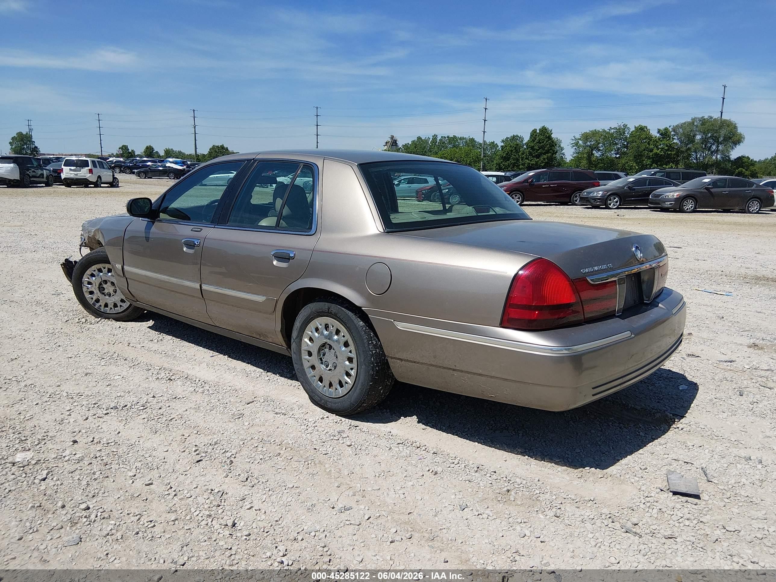 2003 Mercury Grand Marquis Gs Tan vin: 2MEFM74W63X649960
