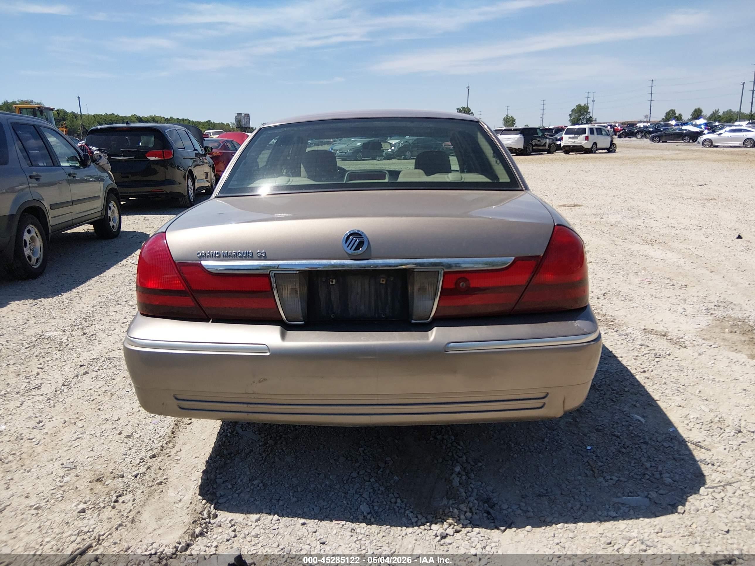 2003 Mercury Grand Marquis Gs Tan vin: 2MEFM74W63X649960