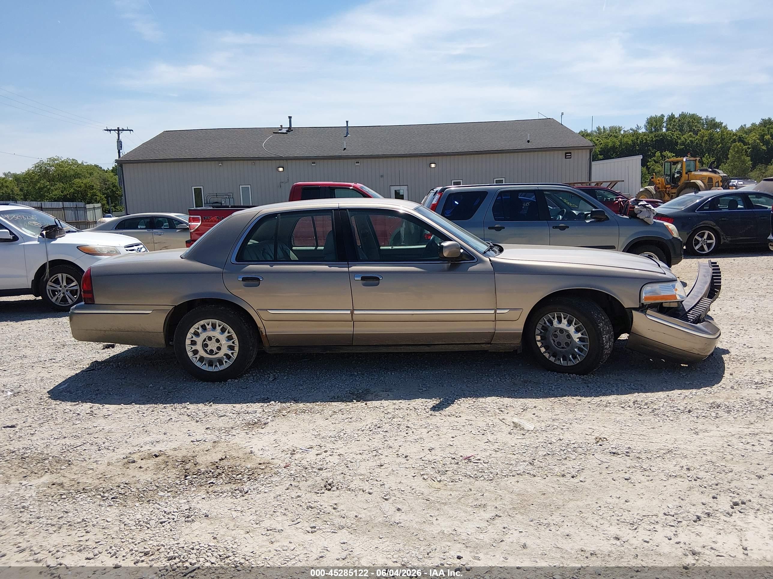 2003 Mercury Grand Marquis Gs Tan vin: 2MEFM74W63X649960